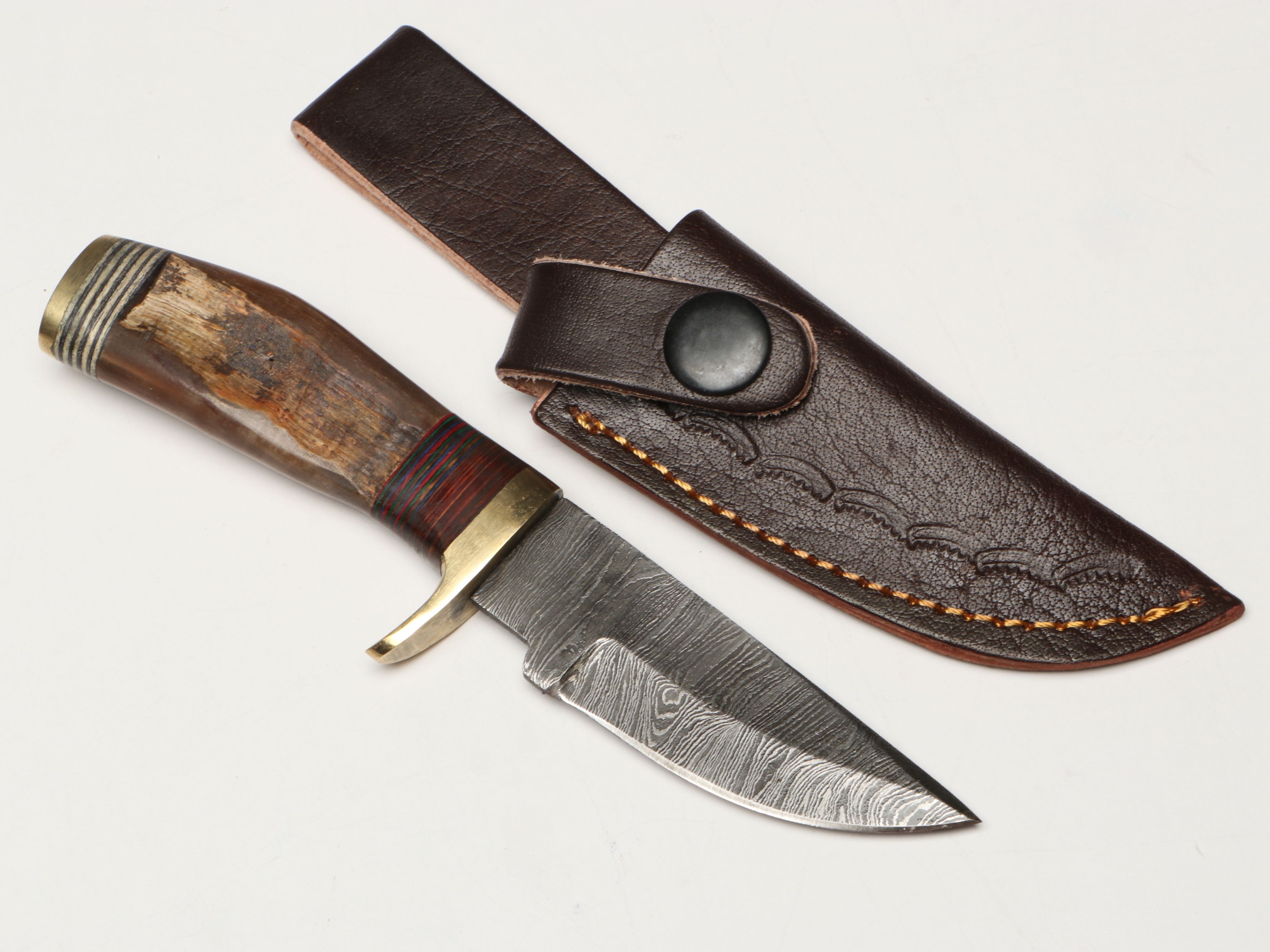Damascus Steel Skinner and Hunting Knives in Leather Scabbards