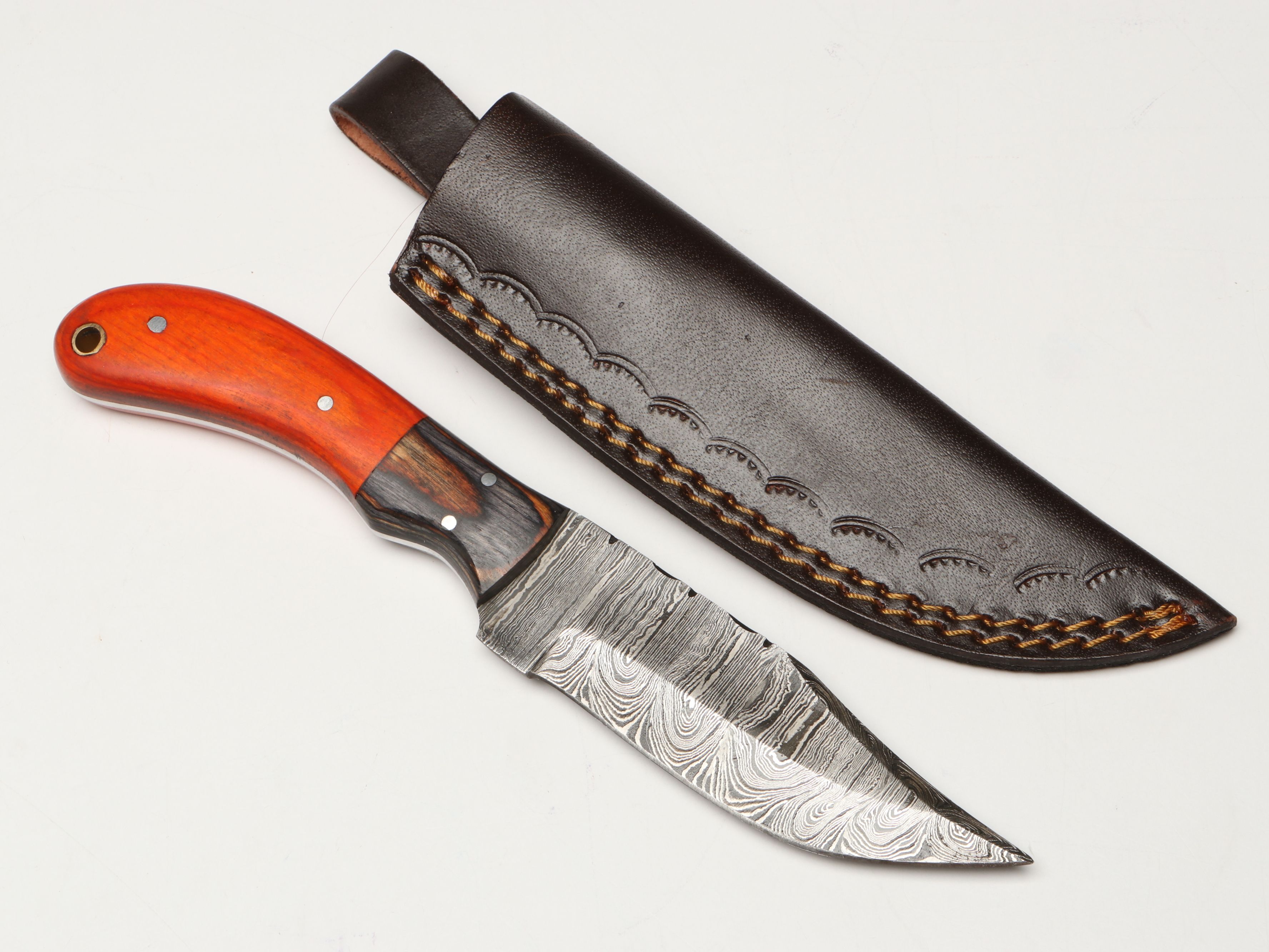 Damascus Steel Skinner and Hunting Knives in Leather Scabbards