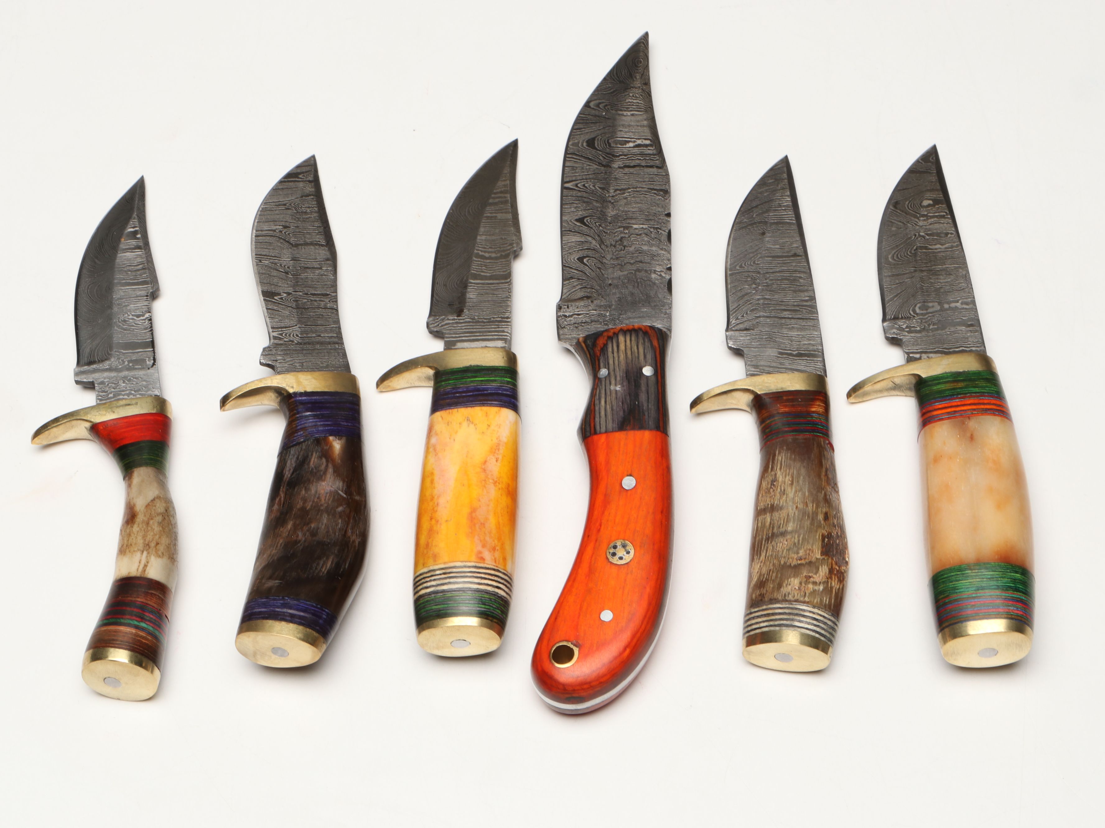 Damascus Steel Skinner and Hunting Knives in Leather Scabbards