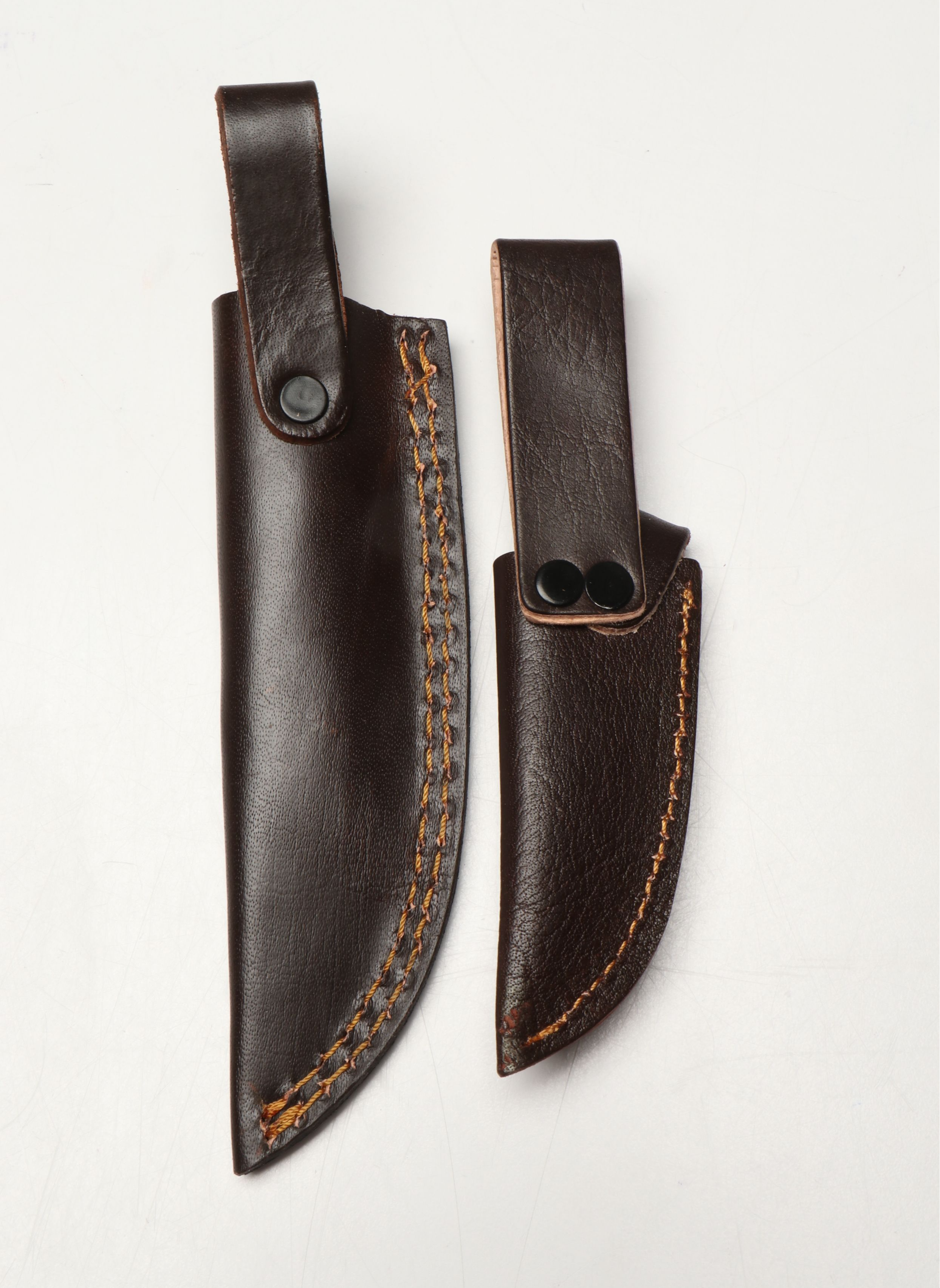 Damascus Steel Skinner and Hunting Knives in Leather Scabbards