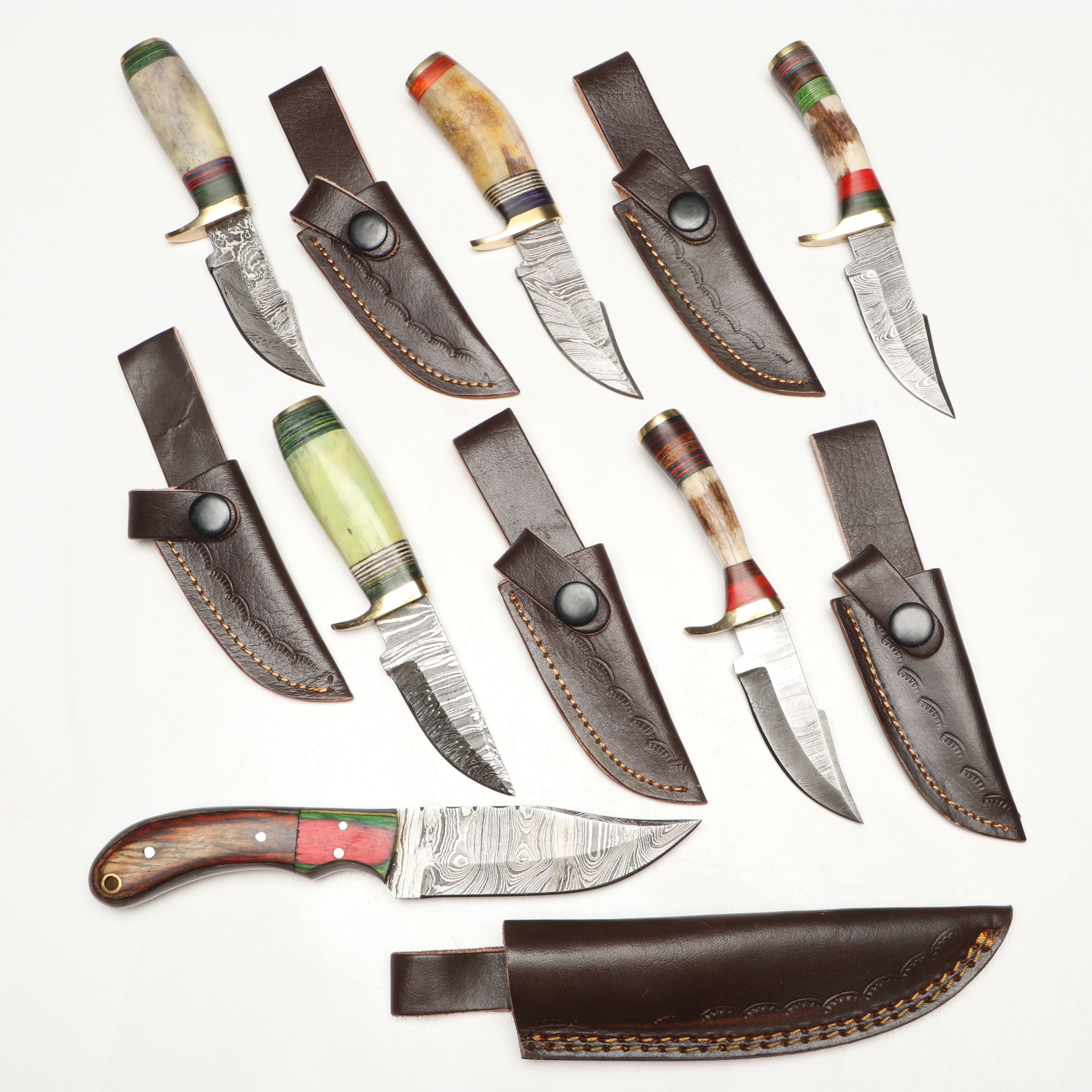 Damascus Steel Skinner and Hunting Knives in Leather Scabbards
