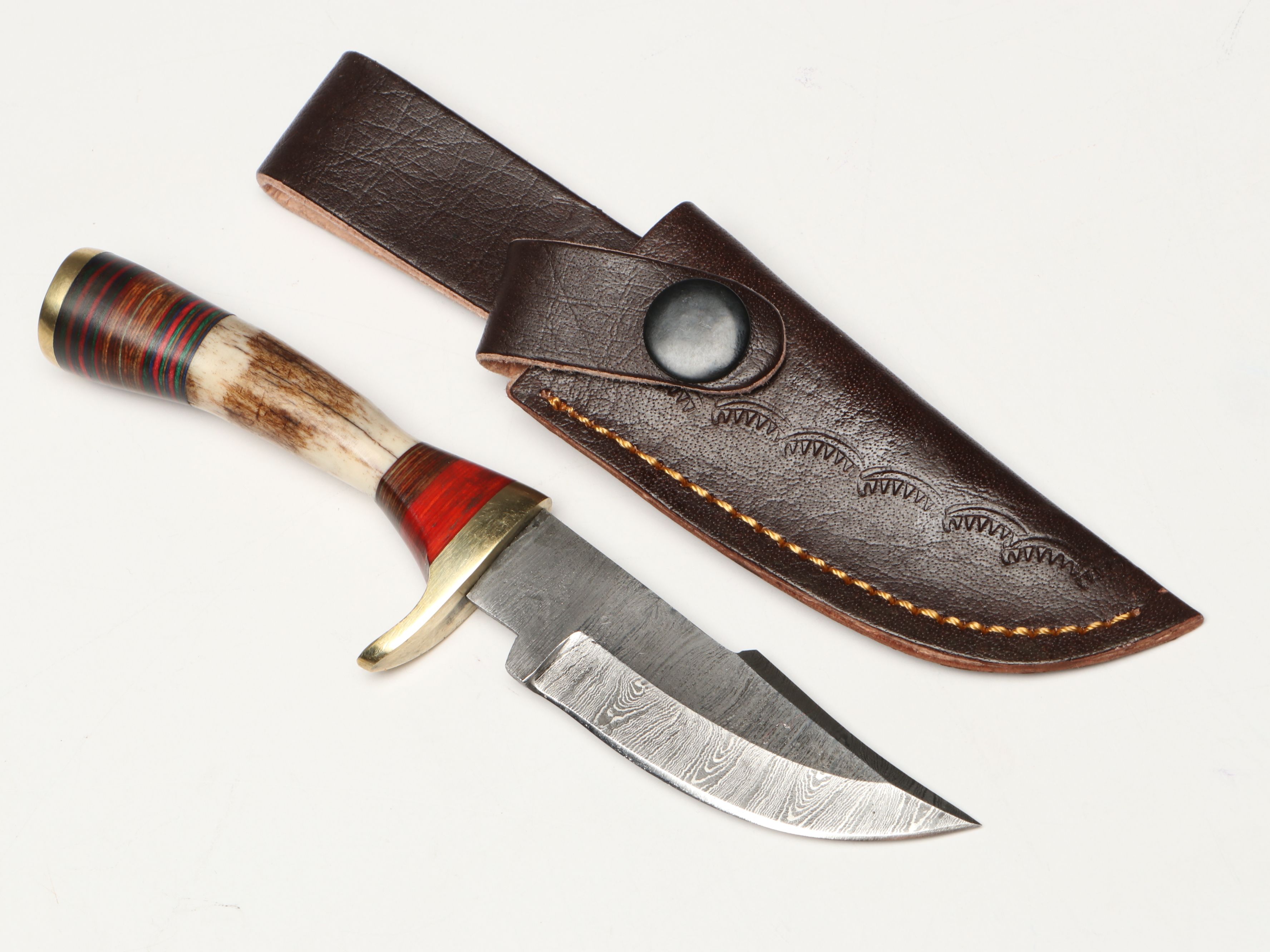 Damascus Steel Skinner and Hunting Knives in Leather Scabbards