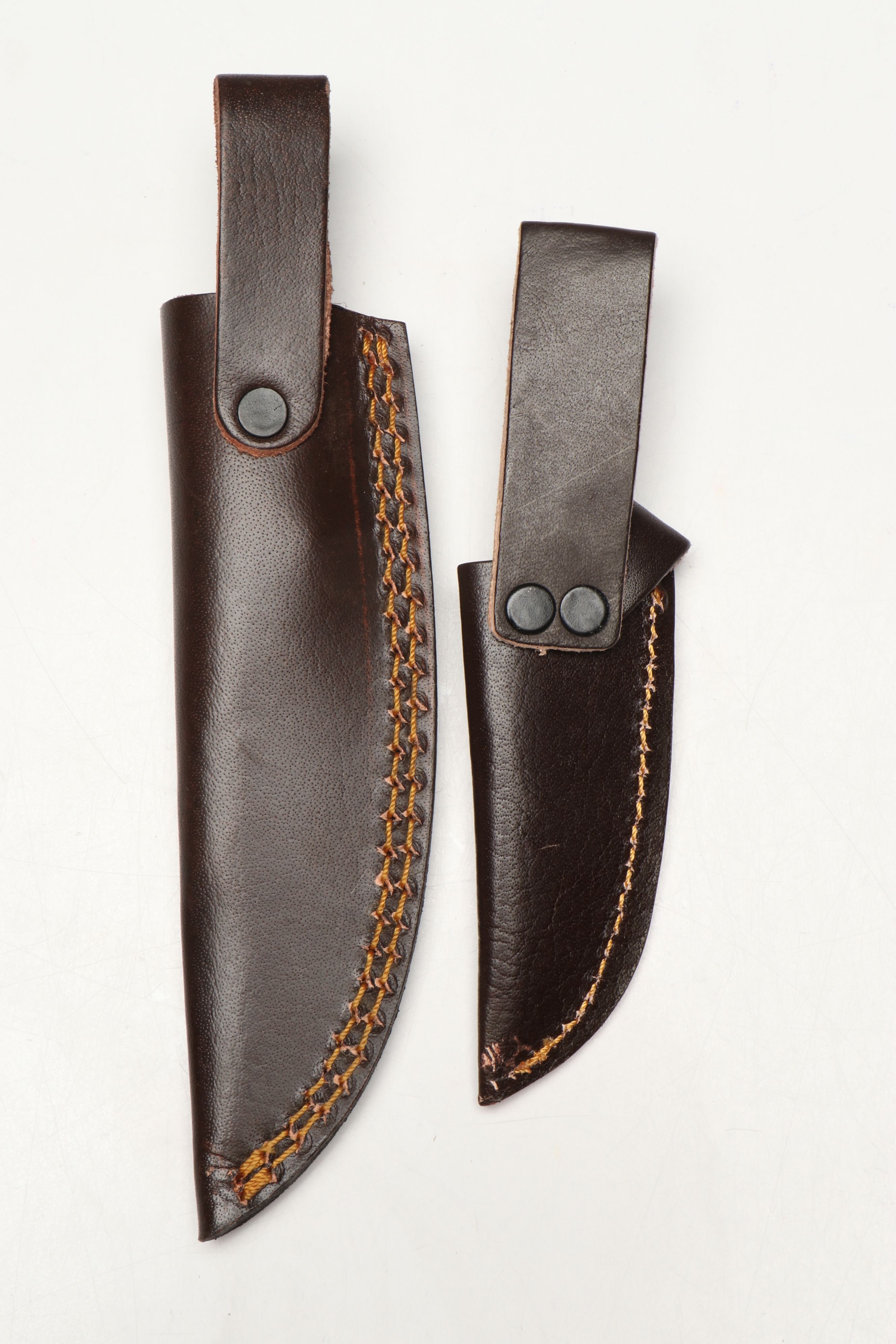 Damascus Steel Skinner and Hunting Knives in Leather Scabbards