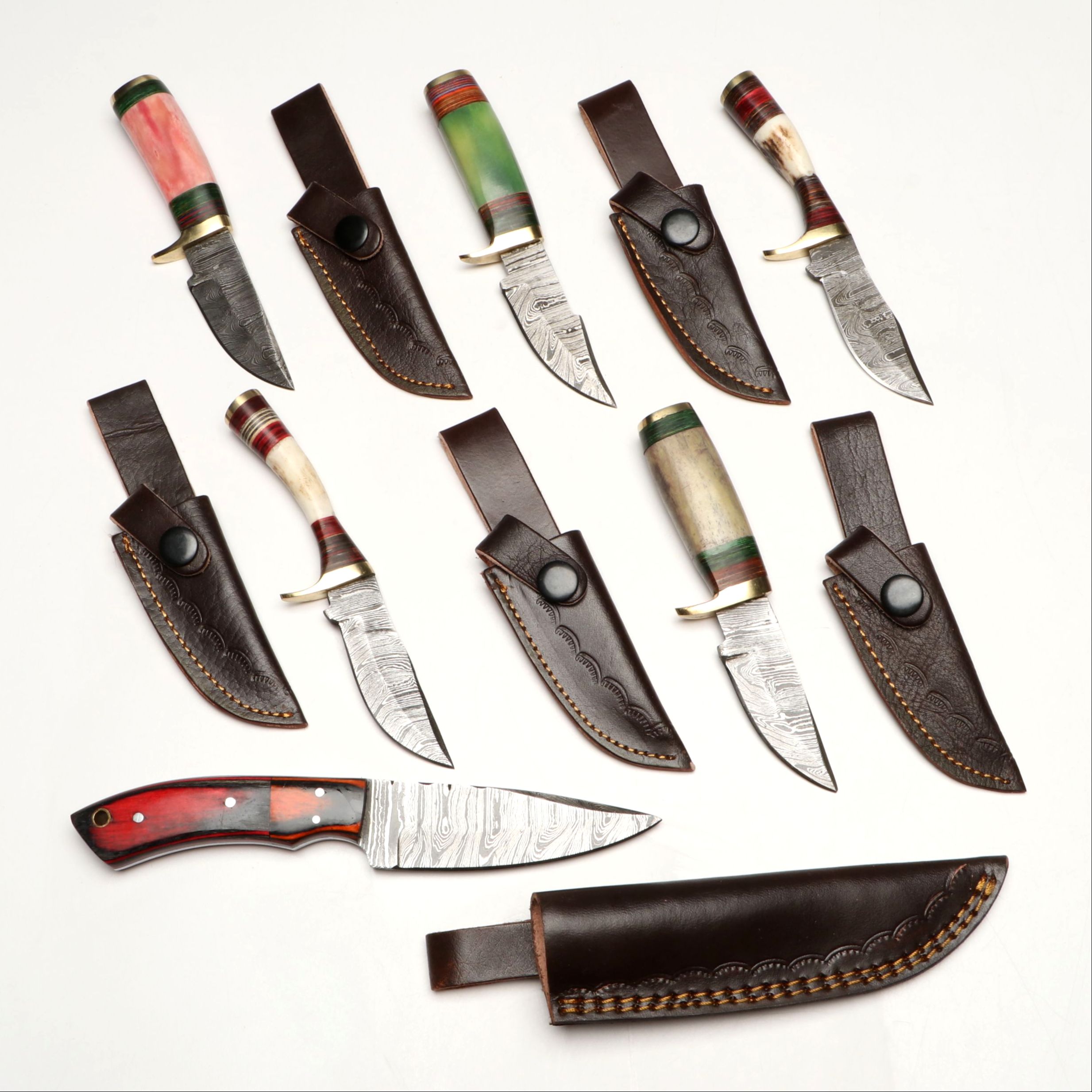 Damascus Steel Skinner and Hunting Knives in Leather Scabbards