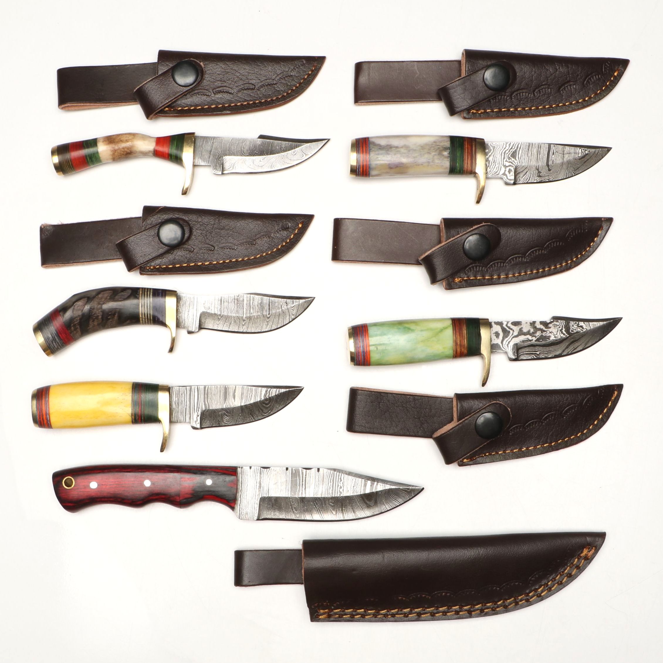 Damascus Steel Skinner and Hunting Knives in Leather Scabbards