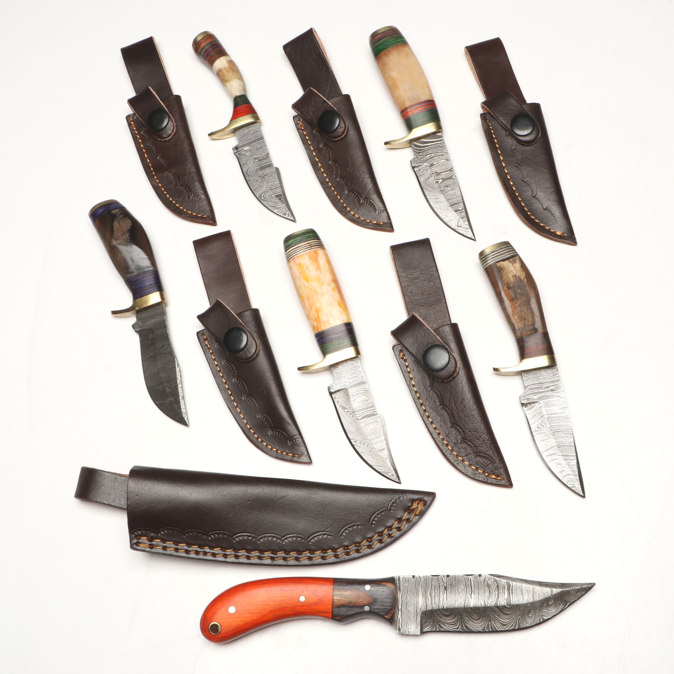 Damascus Steel Skinner and Hunting Knives in Leather Scabbards