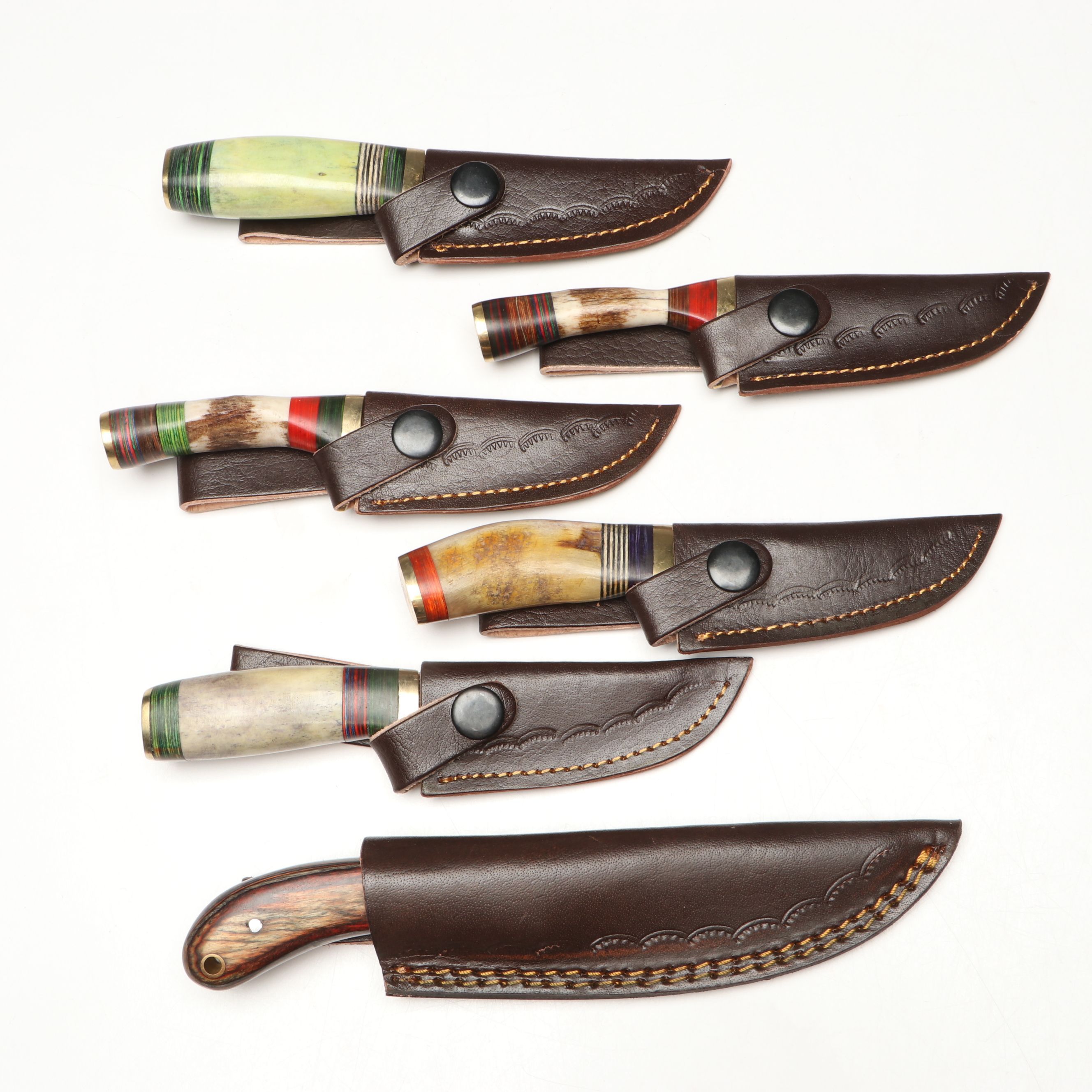 Damascus Steel Skinner and Hunting Knives in Leather Scabbards