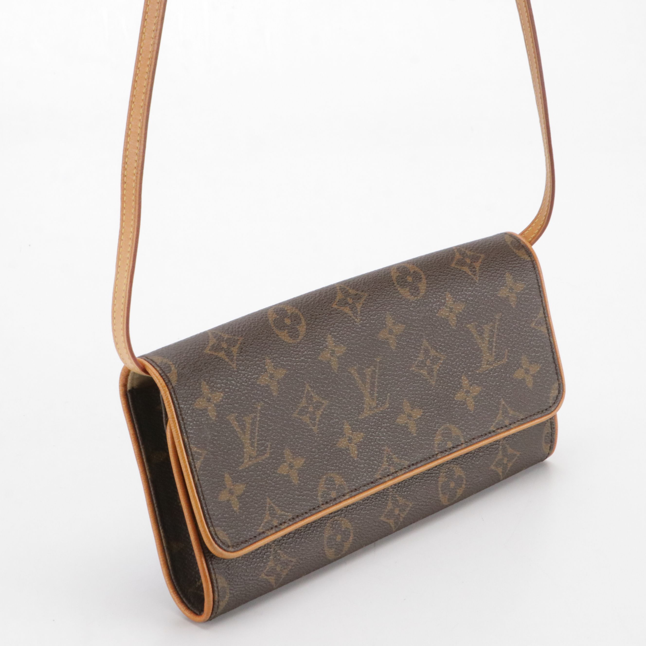 Louis Vuitton Pochette Twin GM in Monogram Canvas and Vachetta Leather