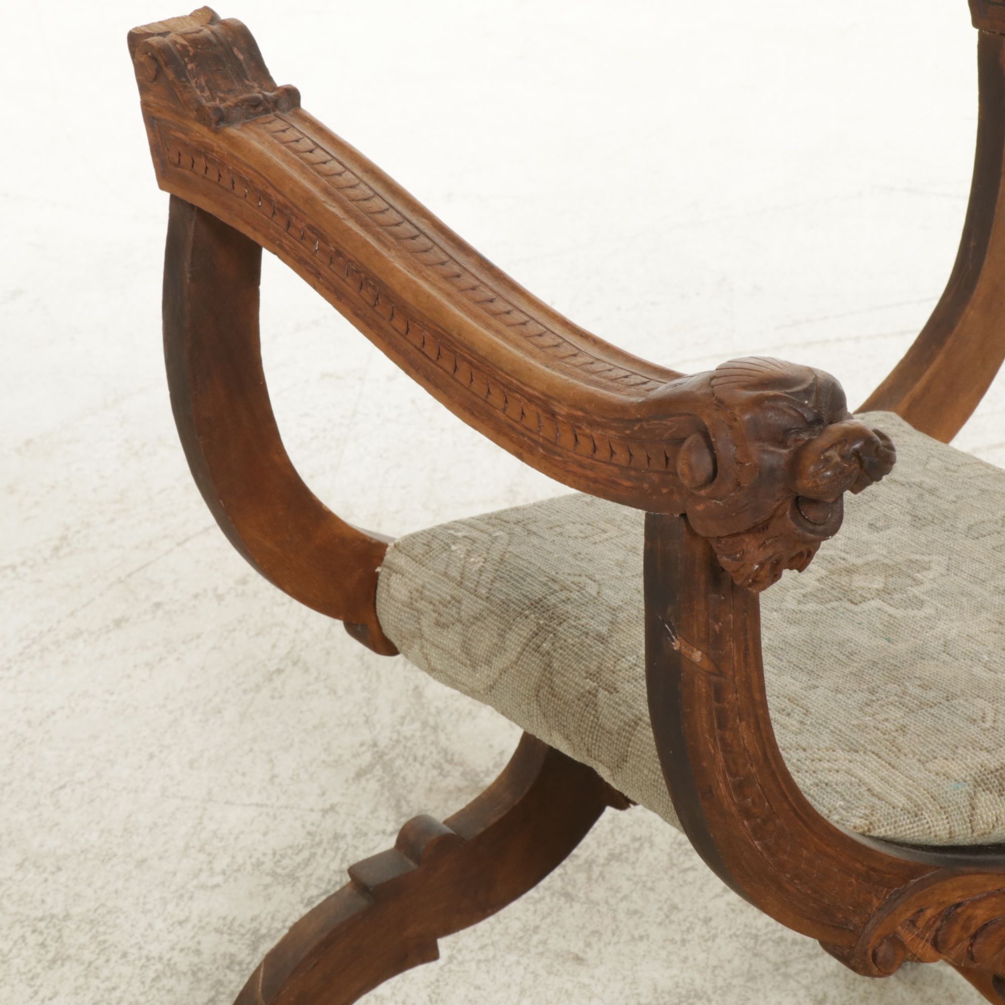 Antique Savonarola Style Chair with Carved Dog's Heads Decorations