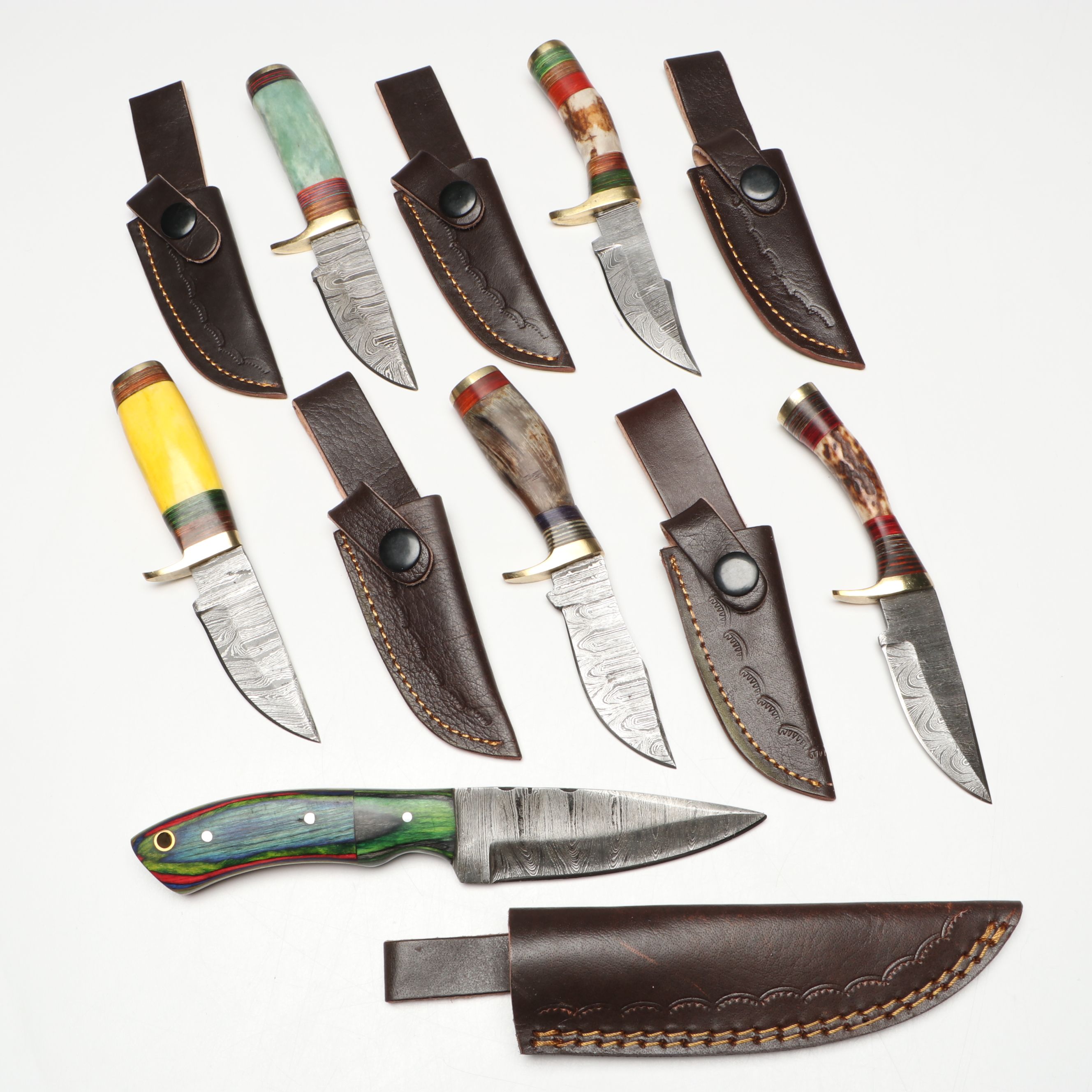 Damascus Steel Skinner and Hunting Knives in Leather Scabbards