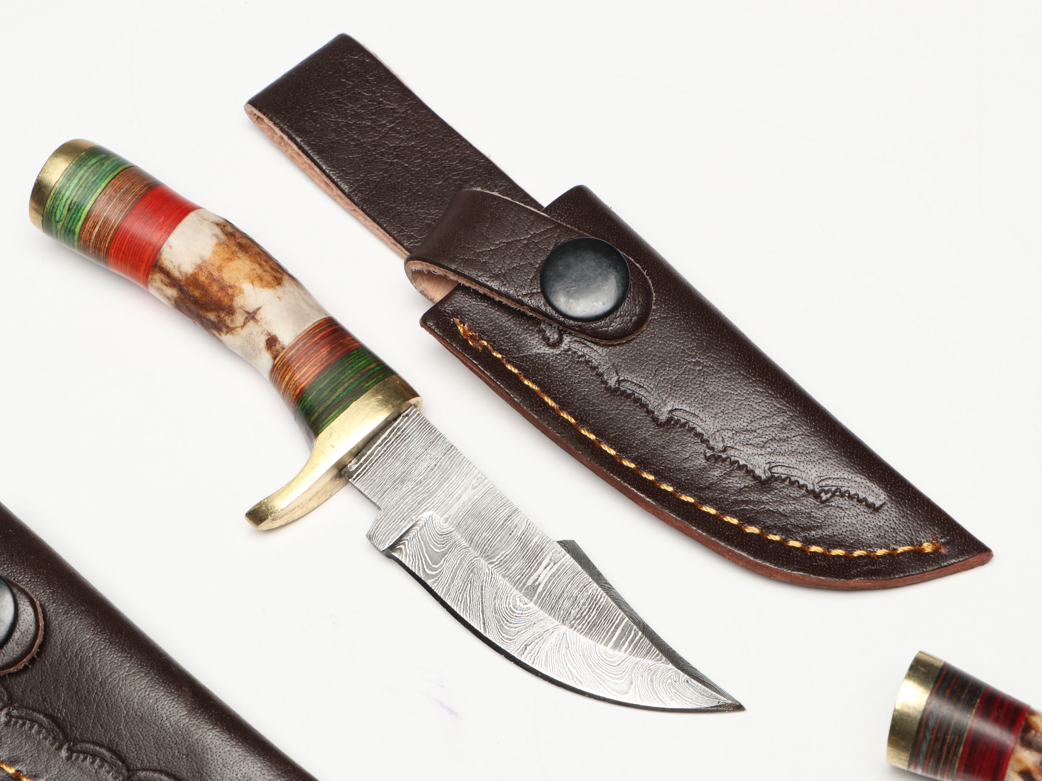 Damascus Steel Skinner and Hunting Knives in Leather Scabbards