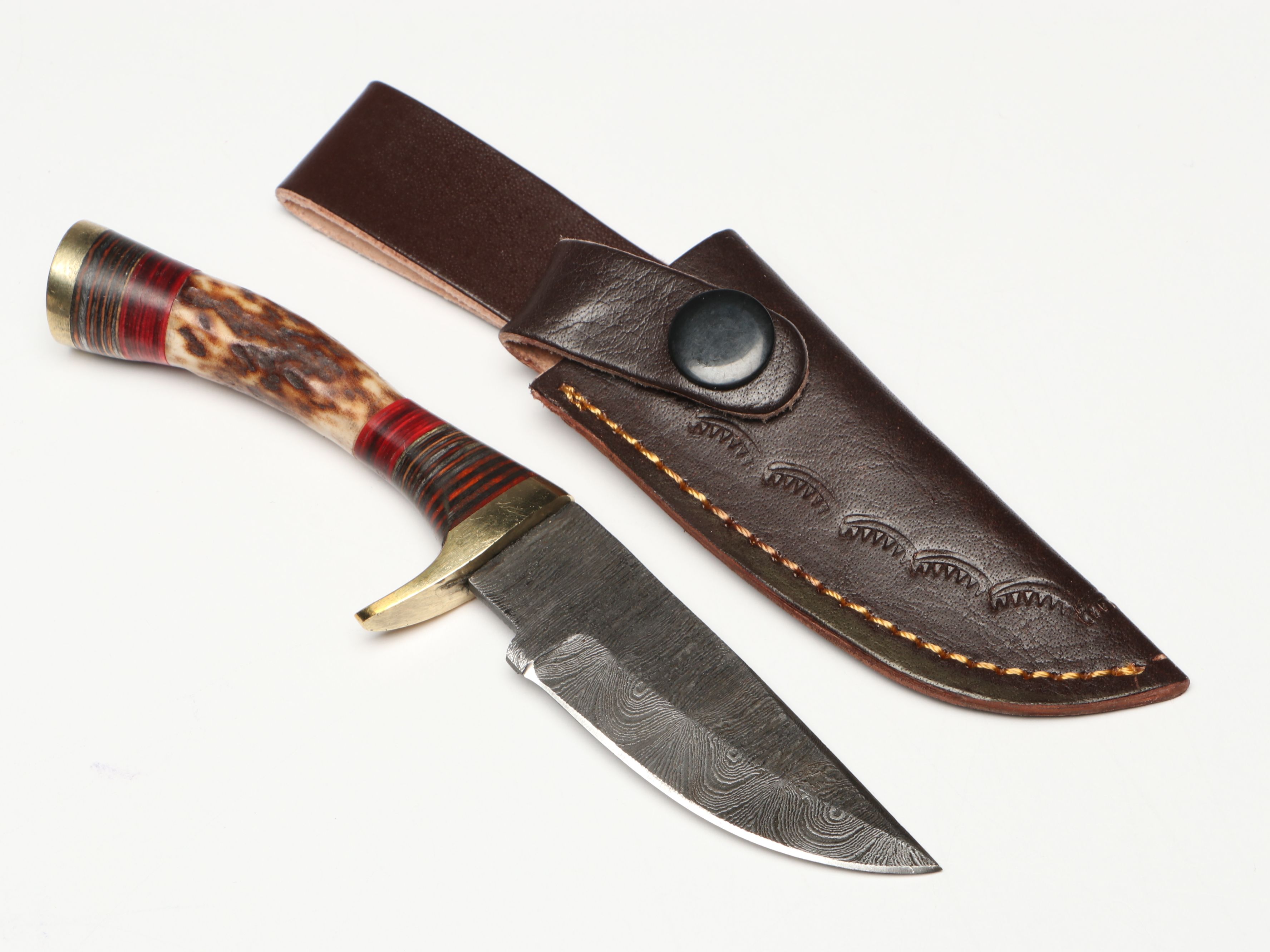 Damascus Steel Skinner and Hunting Knives in Leather Scabbards