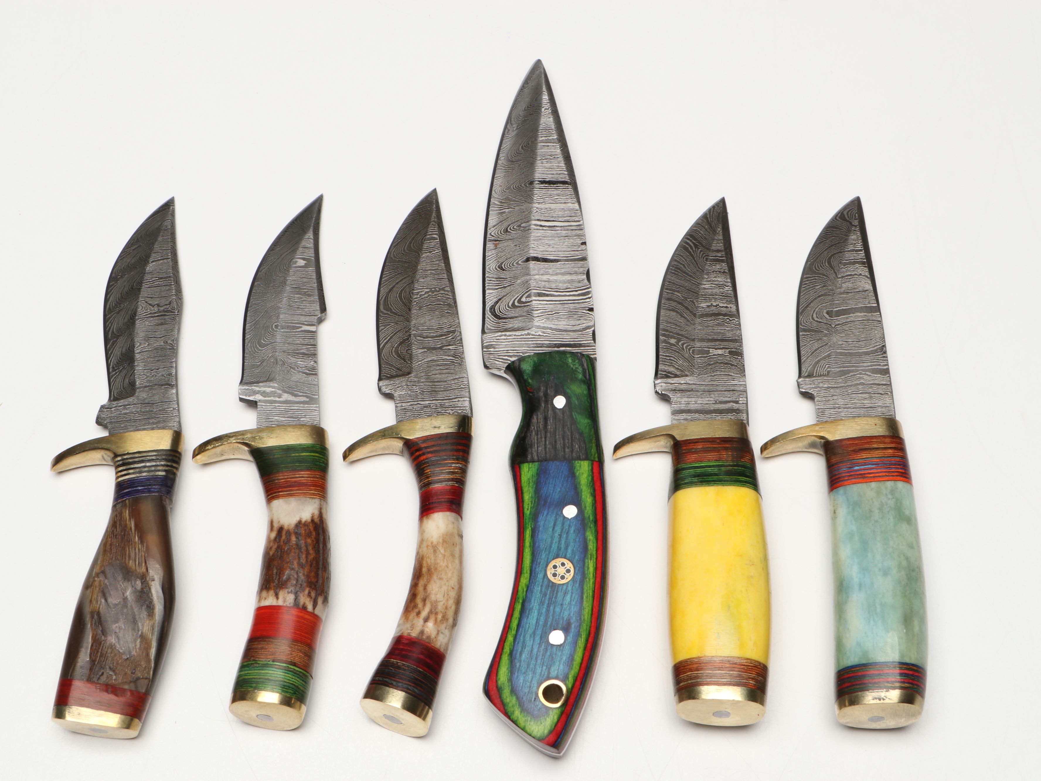 Damascus Steel Skinner and Hunting Knives in Leather Scabbards