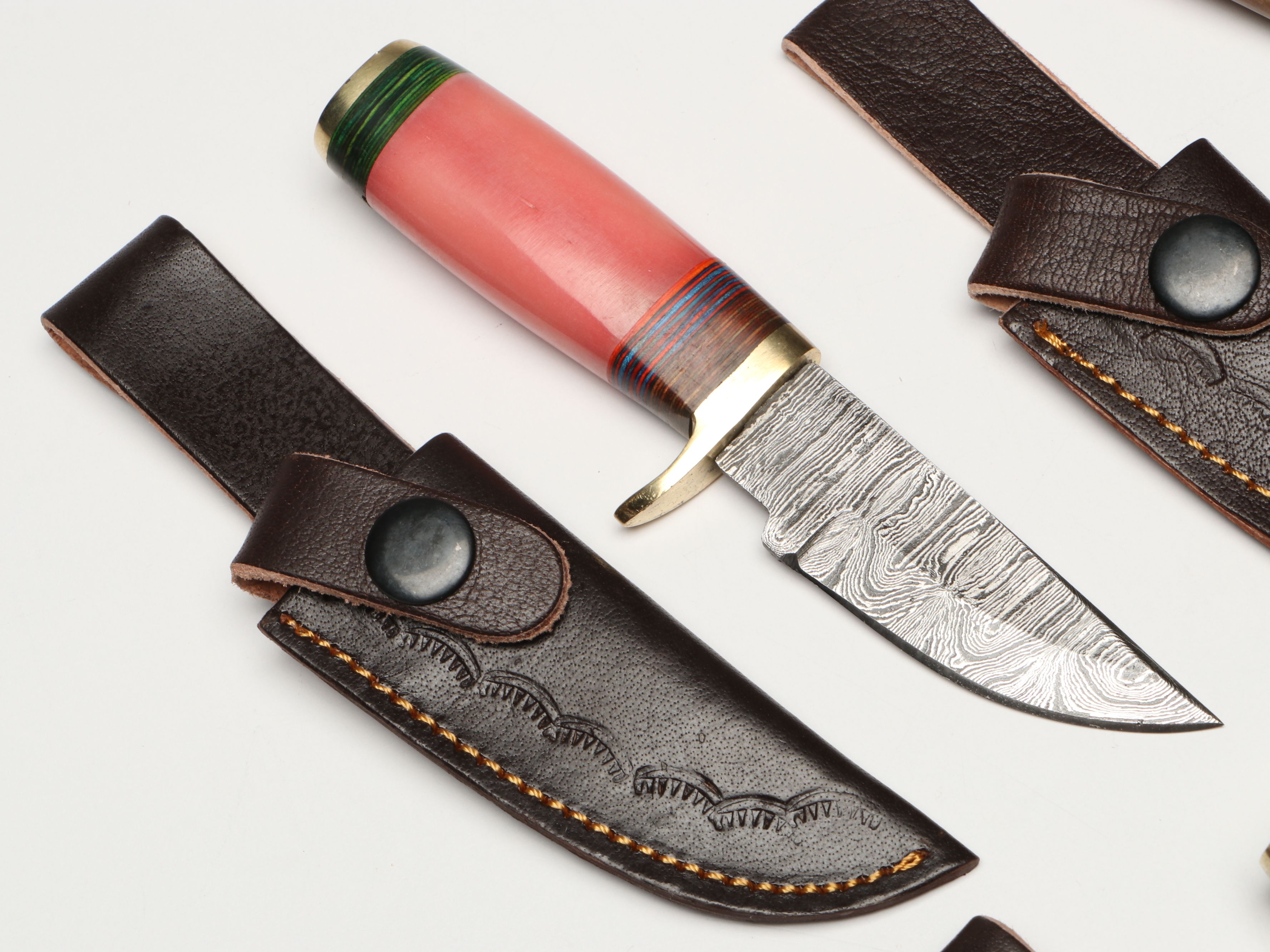 Damascus Steel Skinner and Hunting Knives in Leather Scabbards