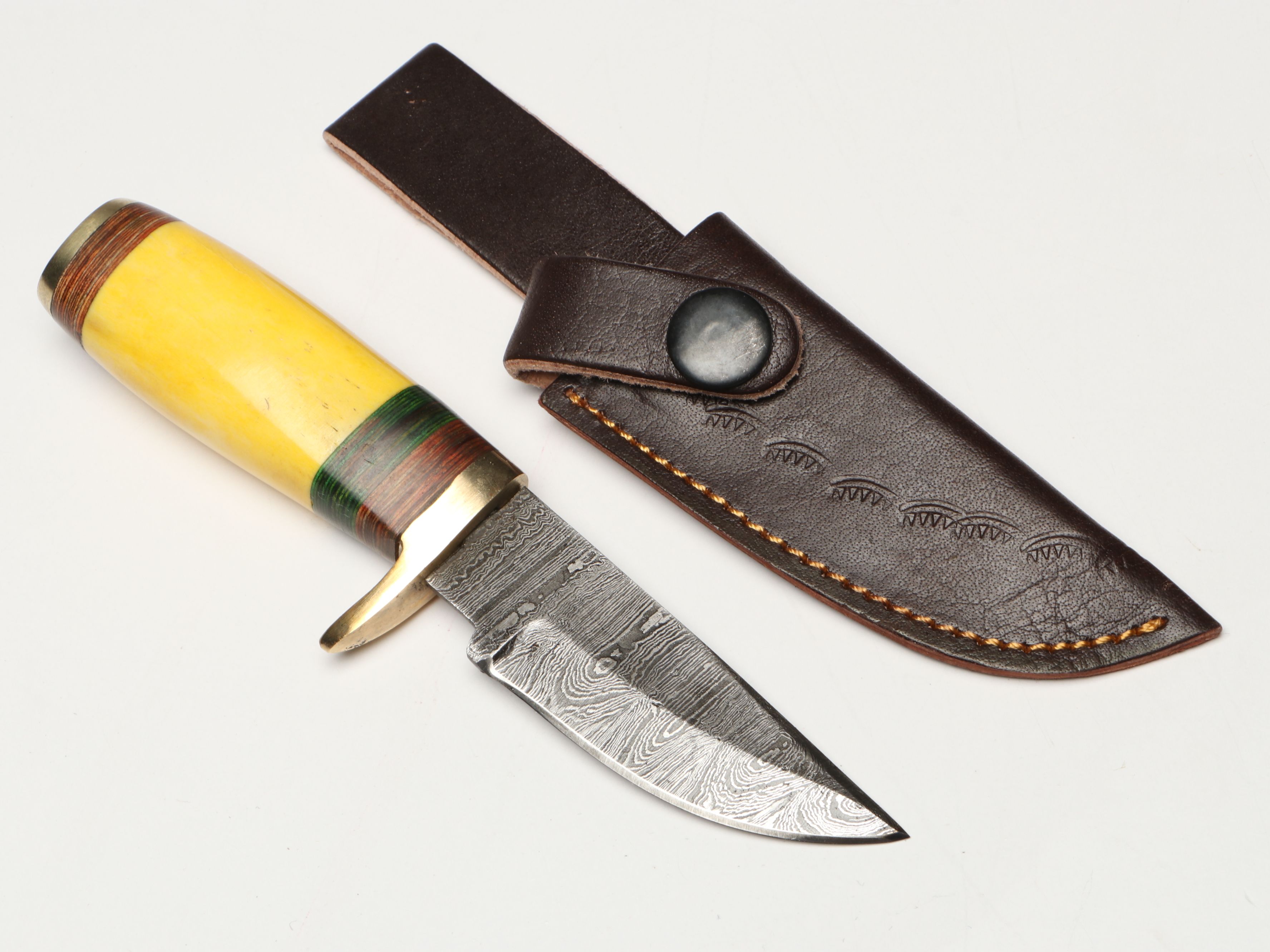 Damascus Steel Skinner and Hunting Knives in Leather Scabbards