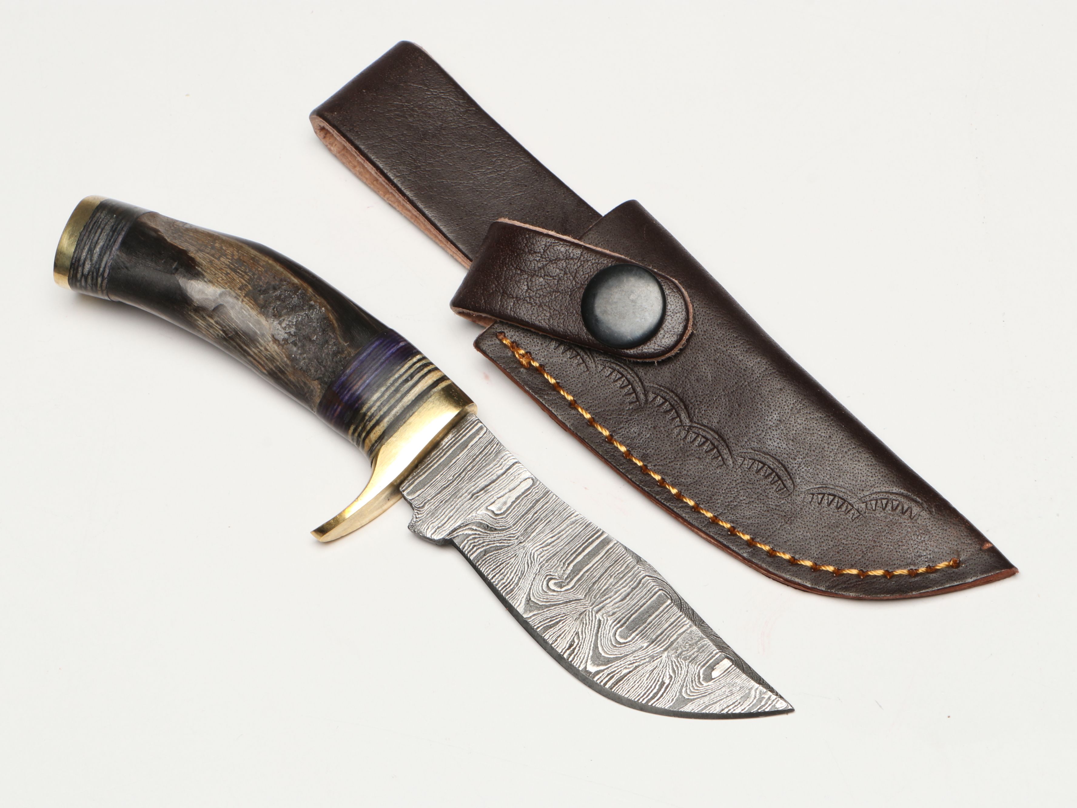 Damascus Steel Skinner and Hunting Knives in Leather Scabbards