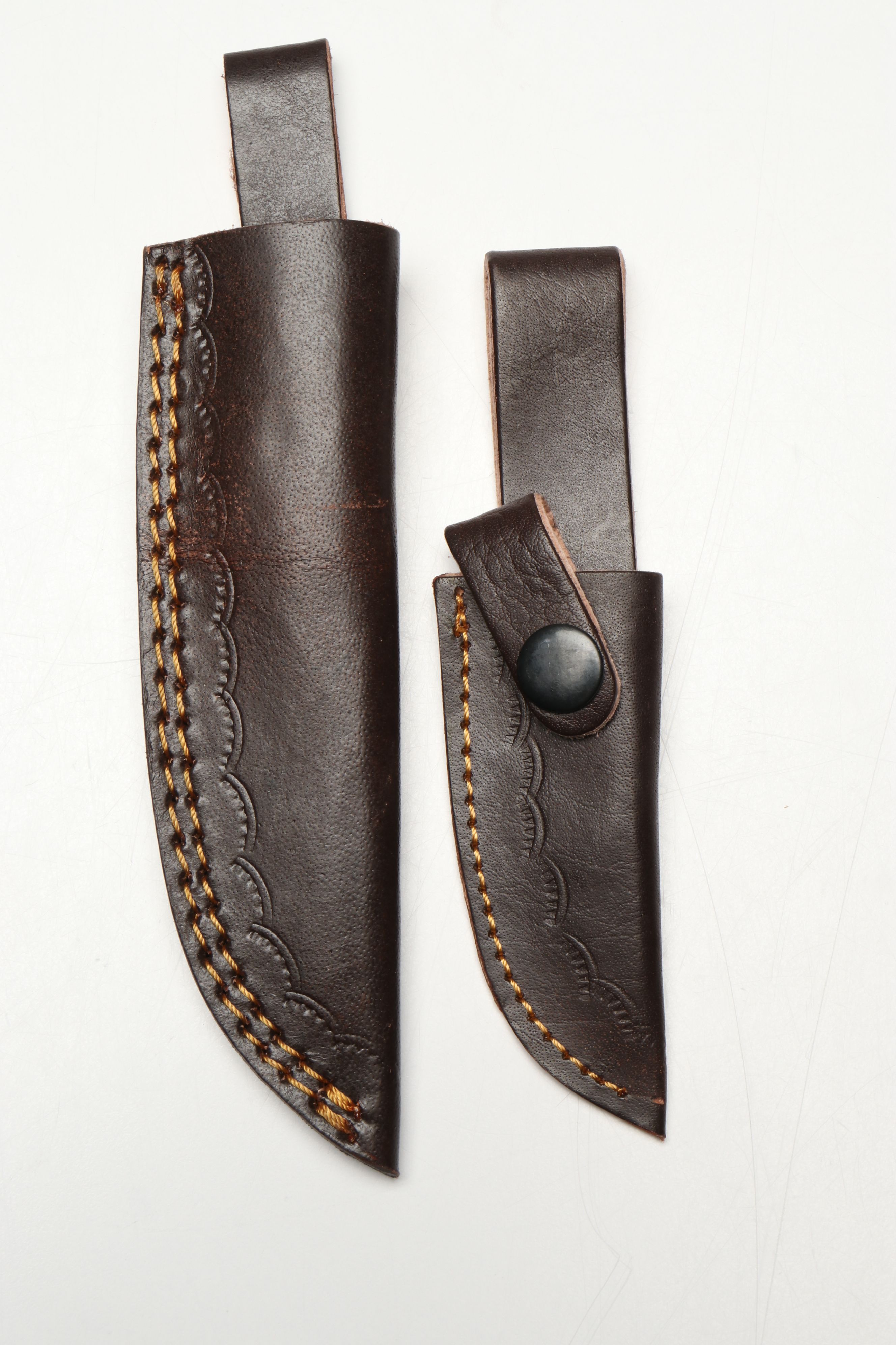 Damascus Steel Skinner and Hunting Knives in Leather Scabbards