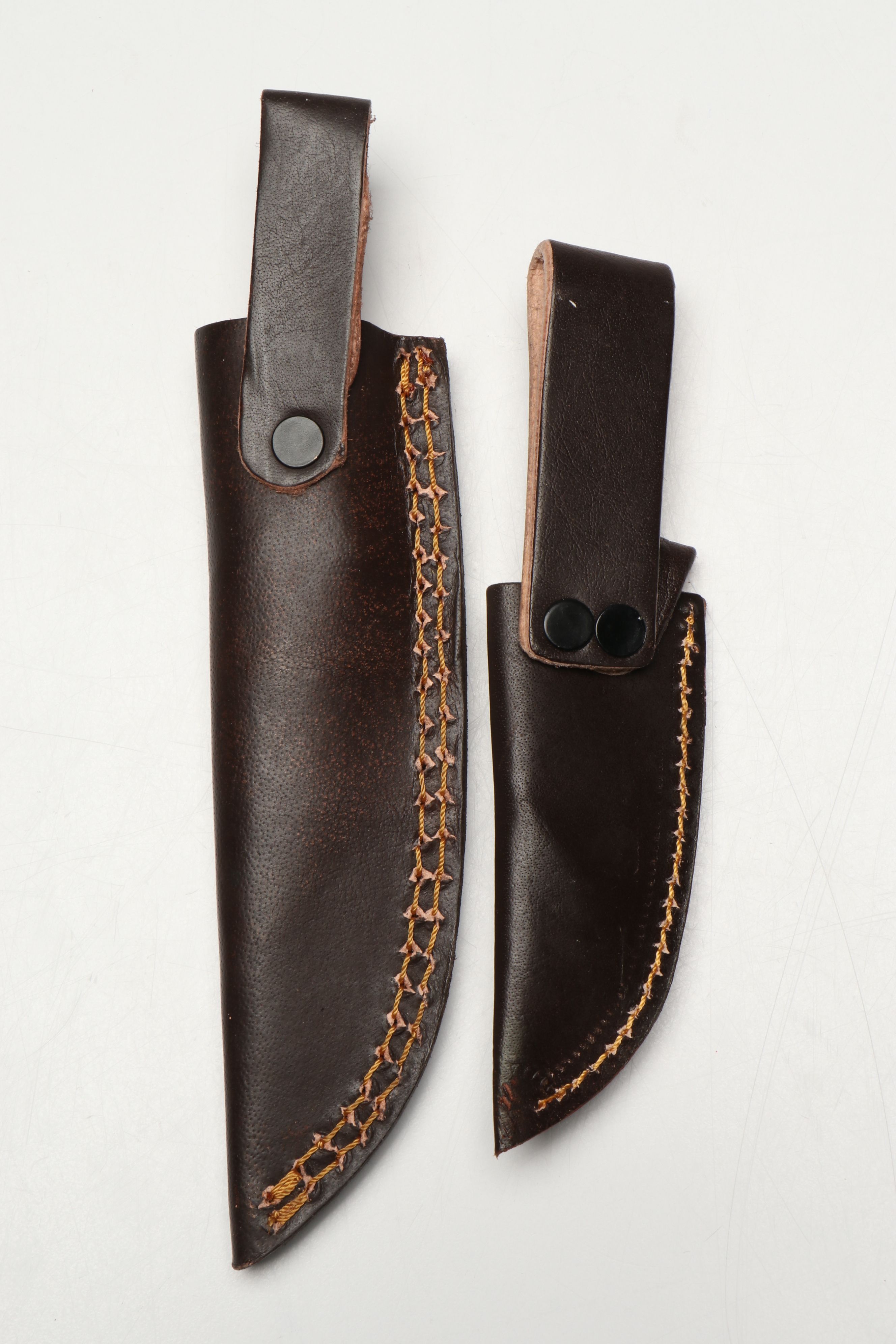 Damascus Steel Skinner and Hunting Knives in Leather Scabbards