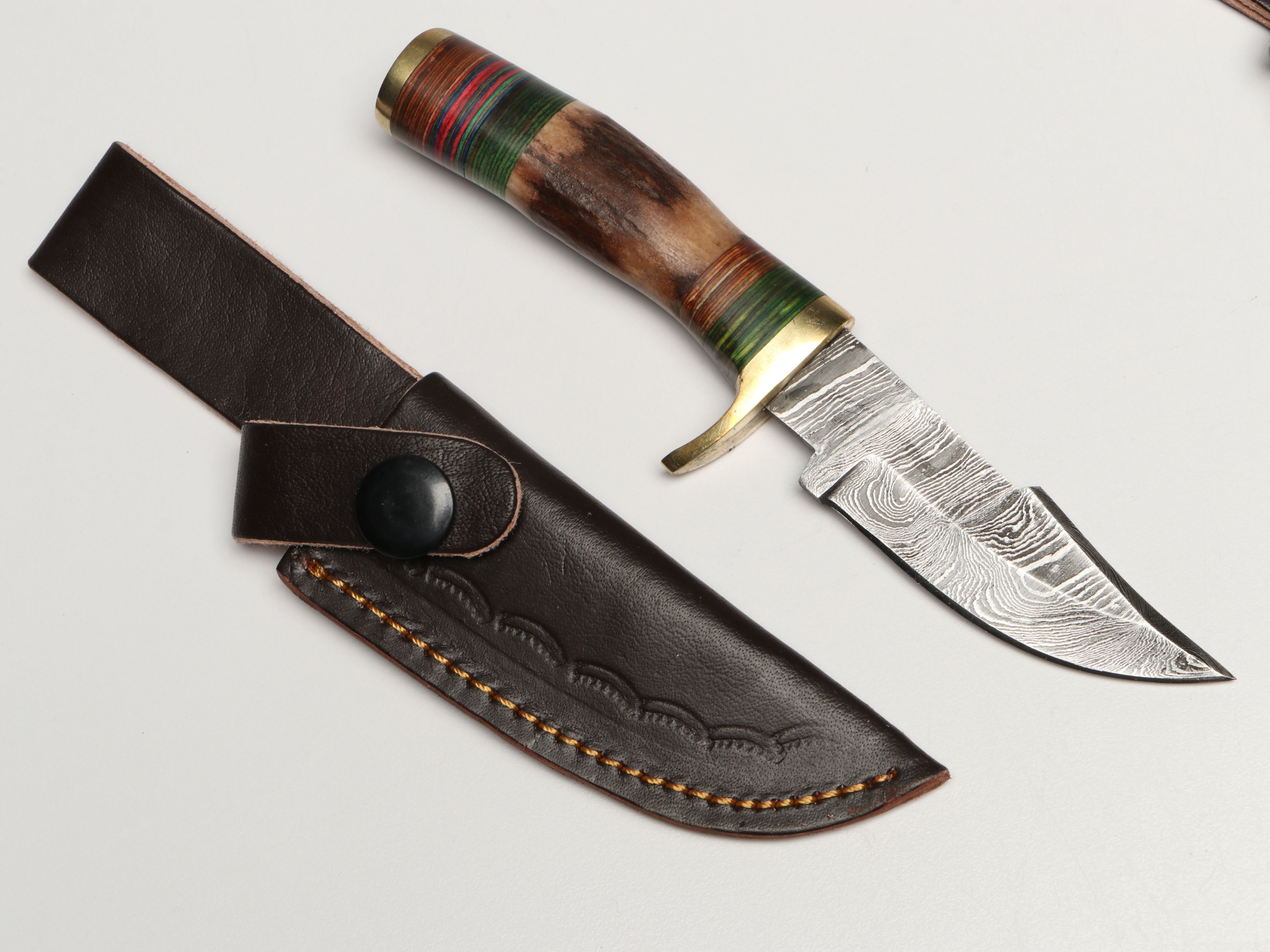 Damascus Steel Skinner and Hunting Knives in Leather Scabbards