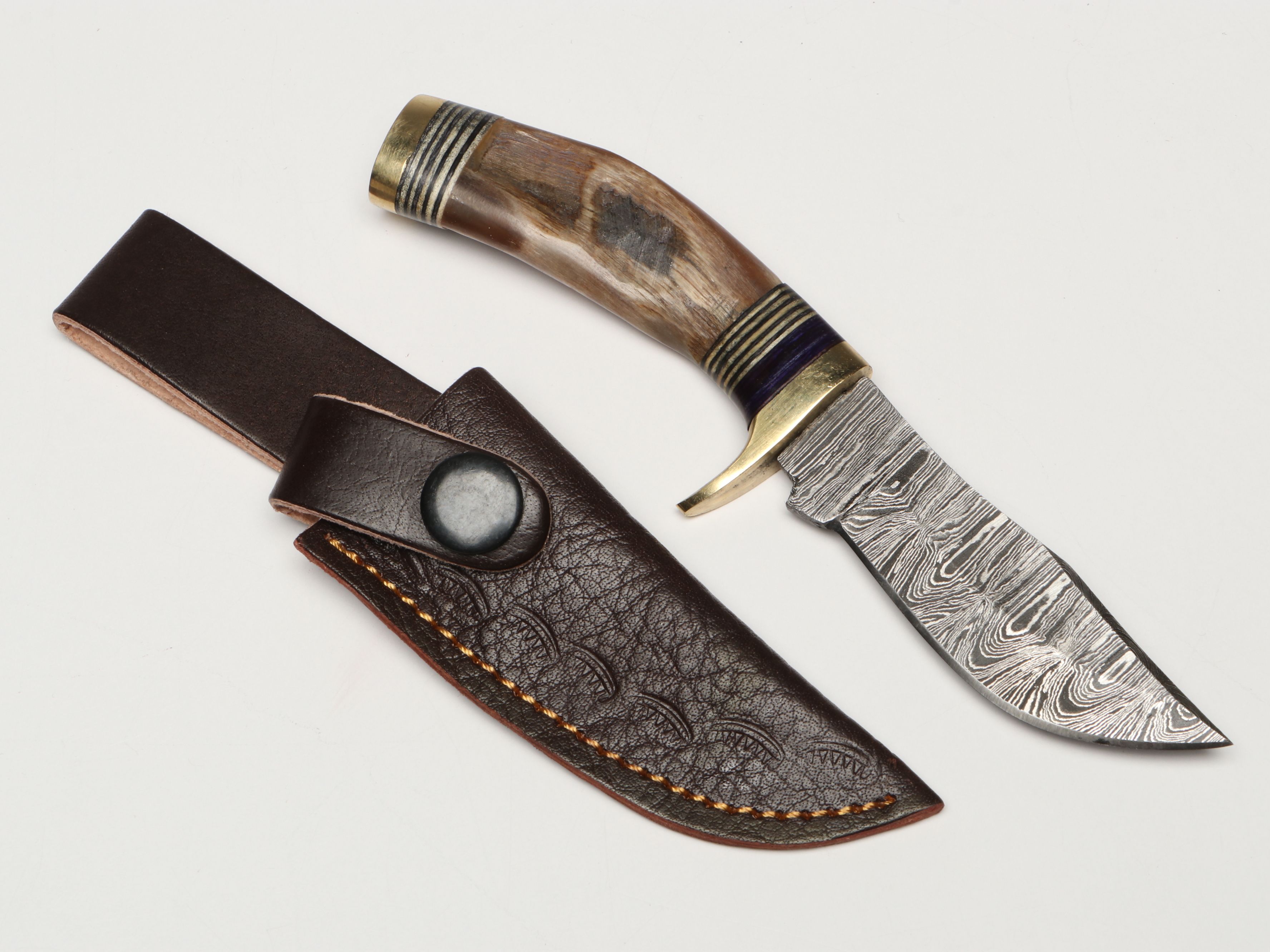 Damascus Steel Skinner and Hunting Knives in Leather Scabbards