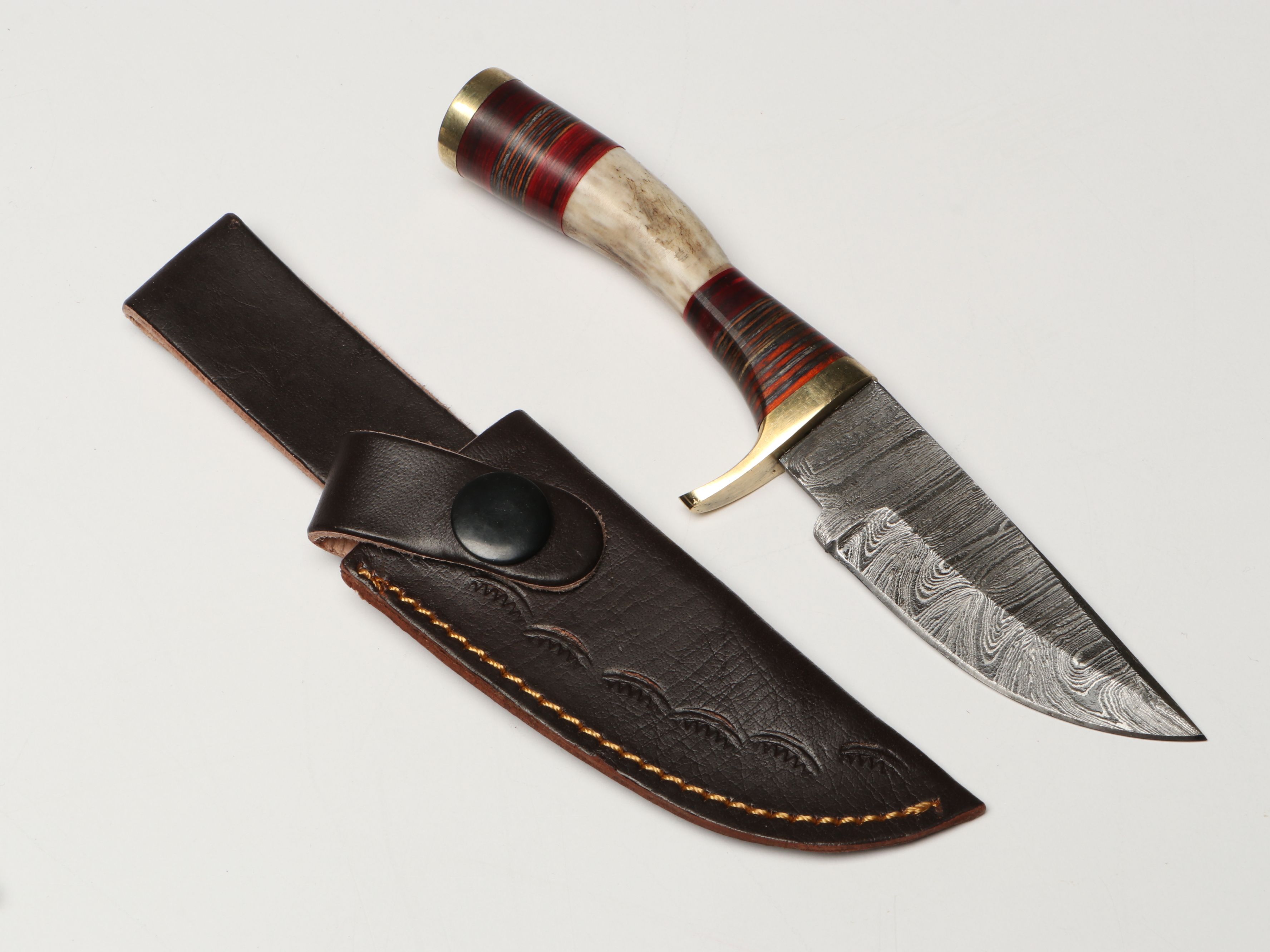Damascus Steel Skinner and Hunting Knives in Leather Scabbards