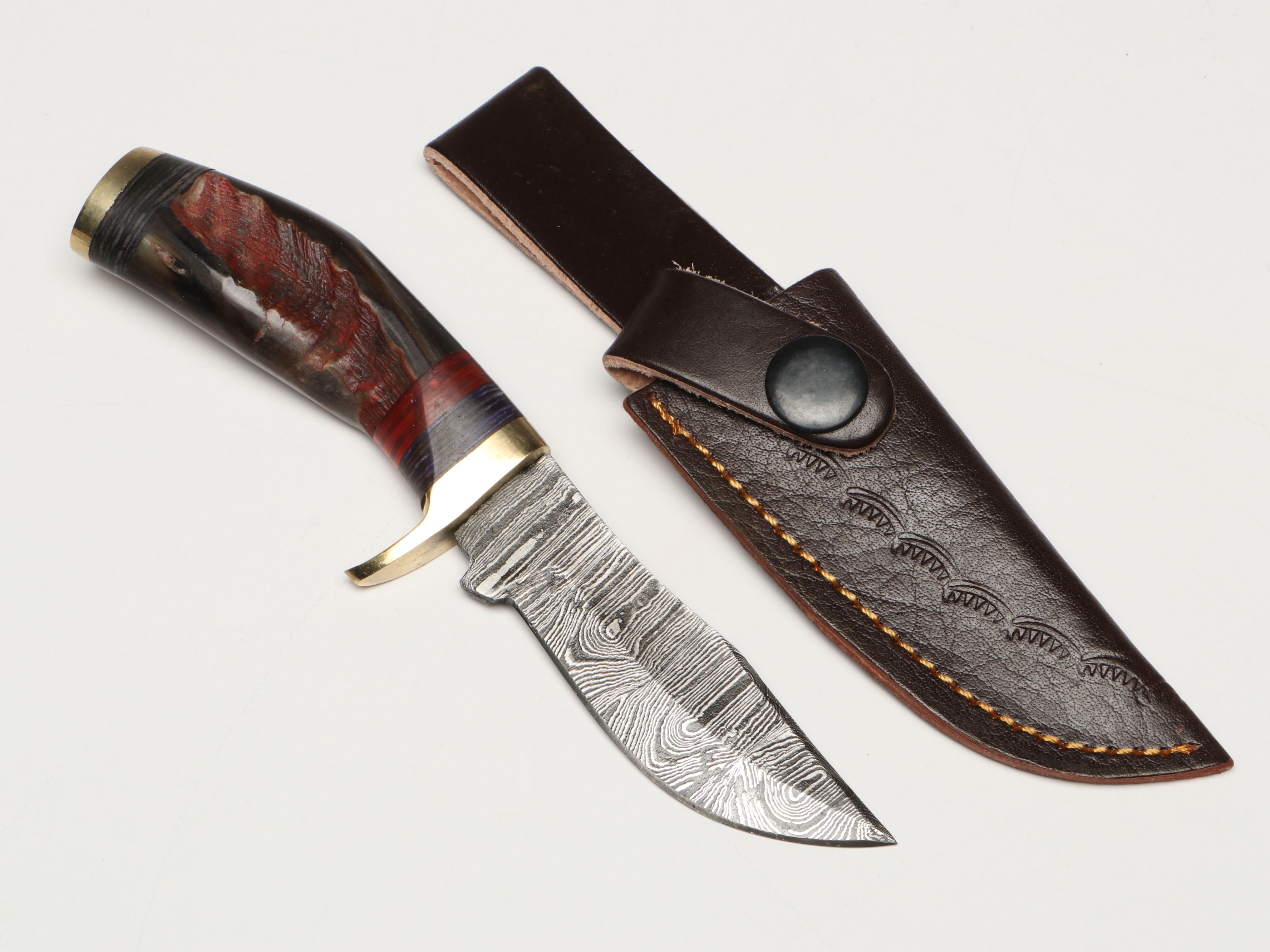 Damascus Steel Skinner and Hunting Knives in Leather Scabbards