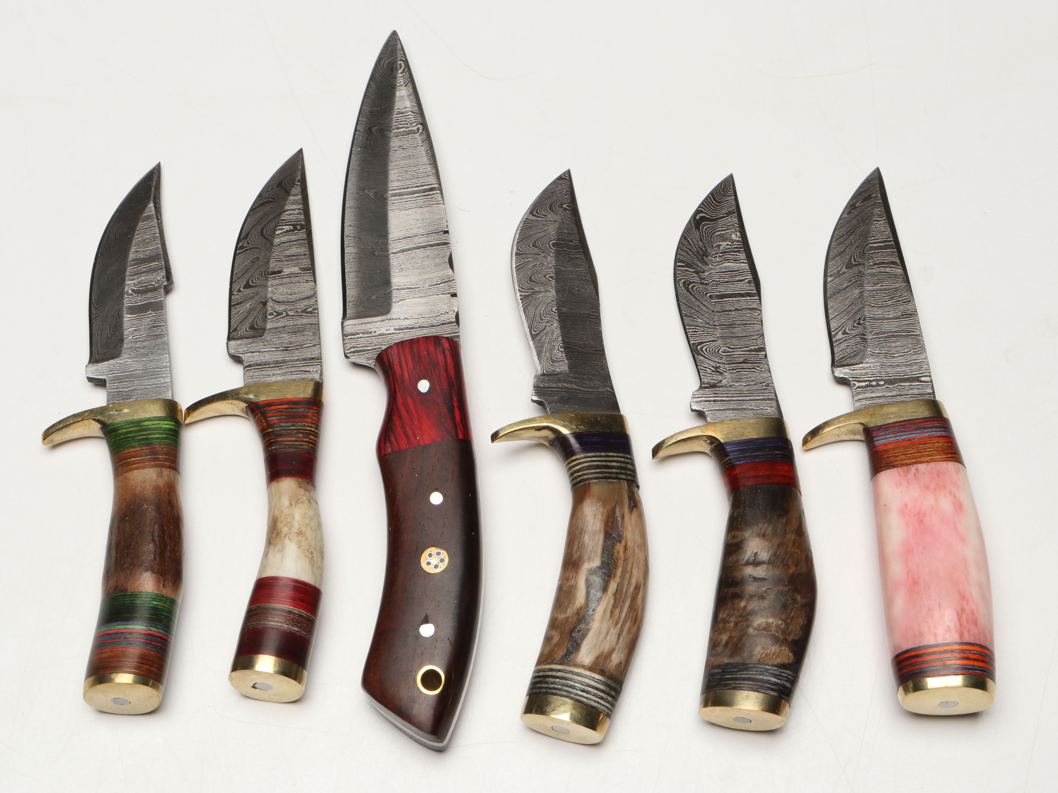 Damascus Steel Skinner and Hunting Knives in Leather Scabbards