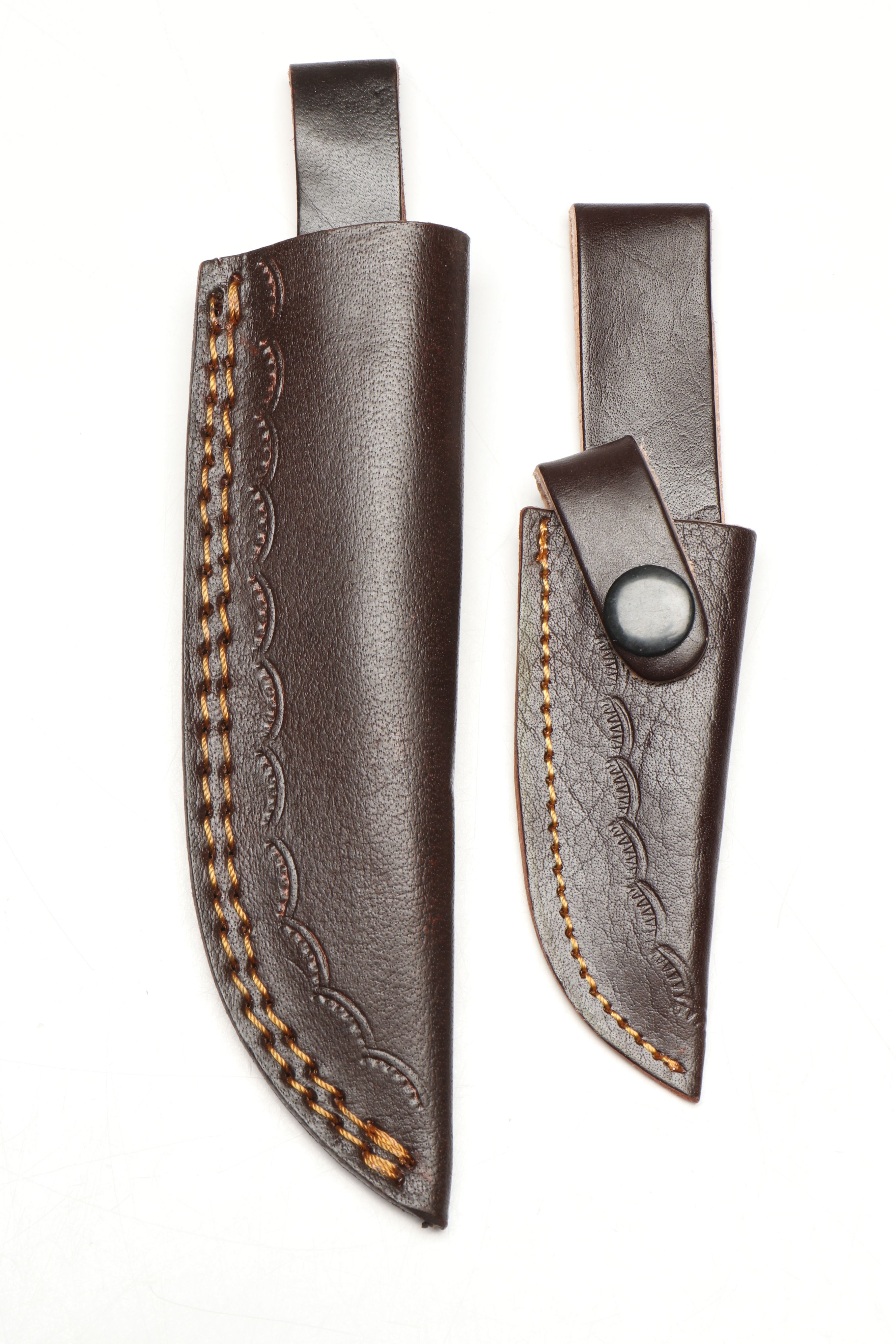 Damascus Steel Skinner and Hunting Knives in Leather Scabbards