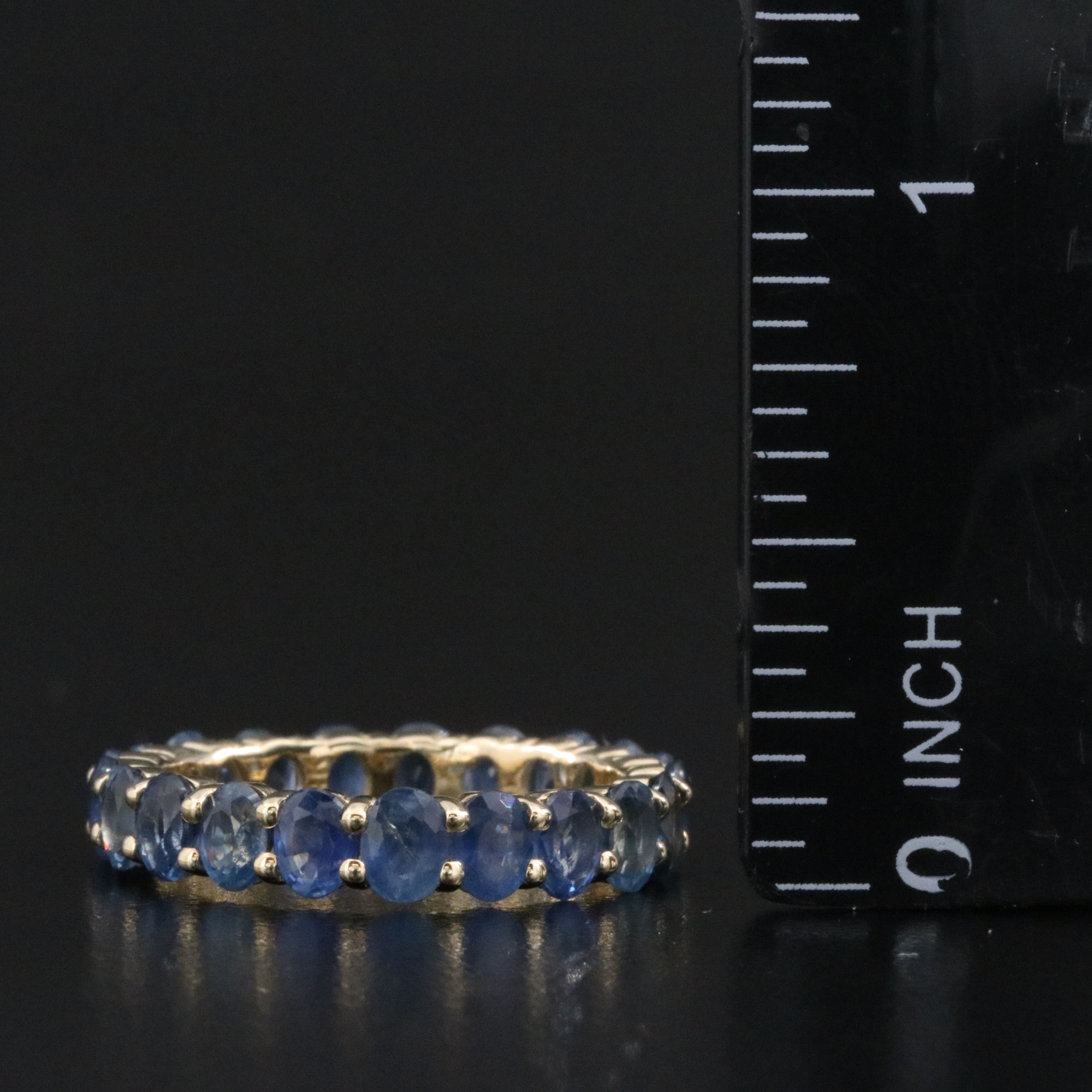 14K 5.51 CTW Sapphire Eternity Band with IGI Jewelry Report