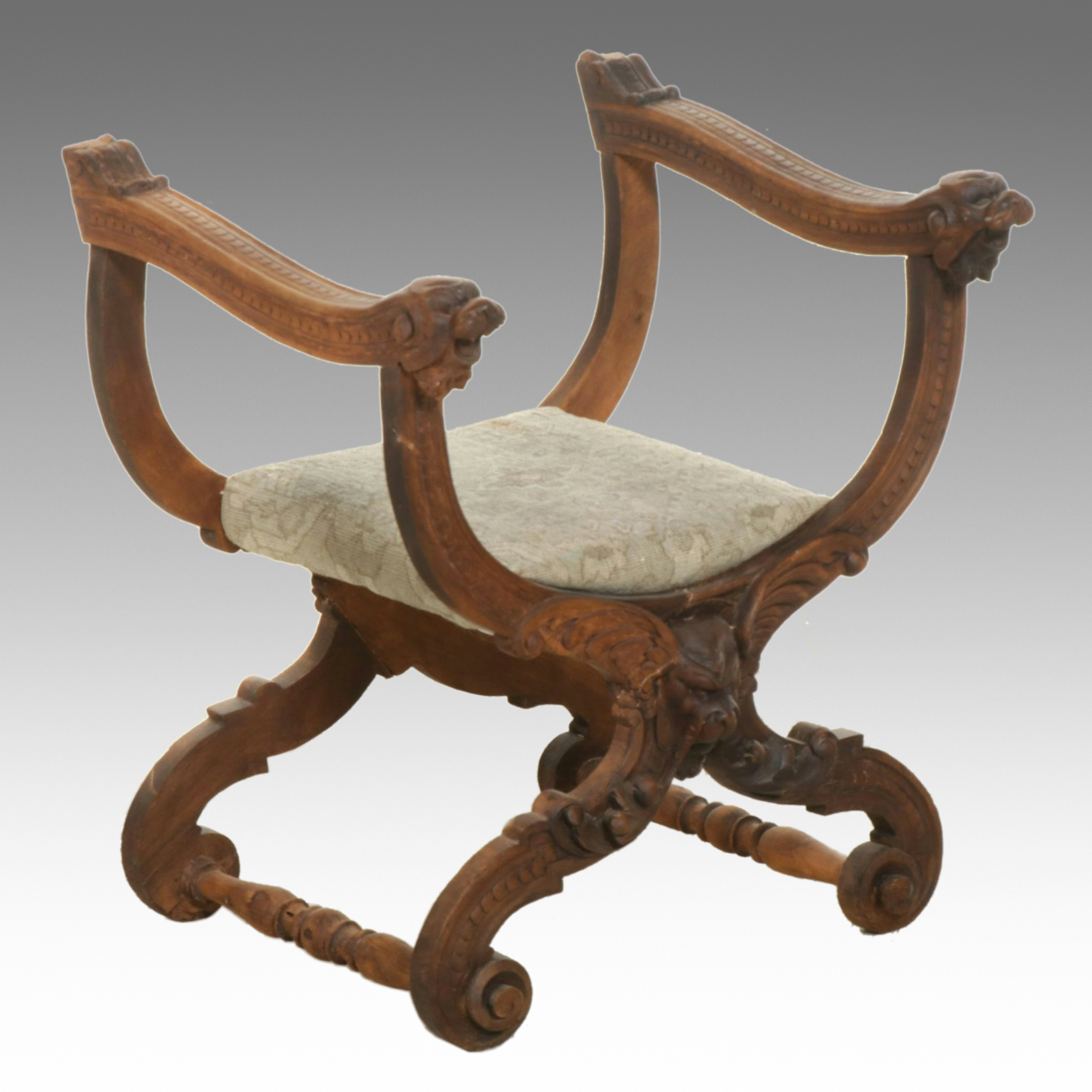 Antique Savonarola Style Chair with Carved Dog's Heads Decorations