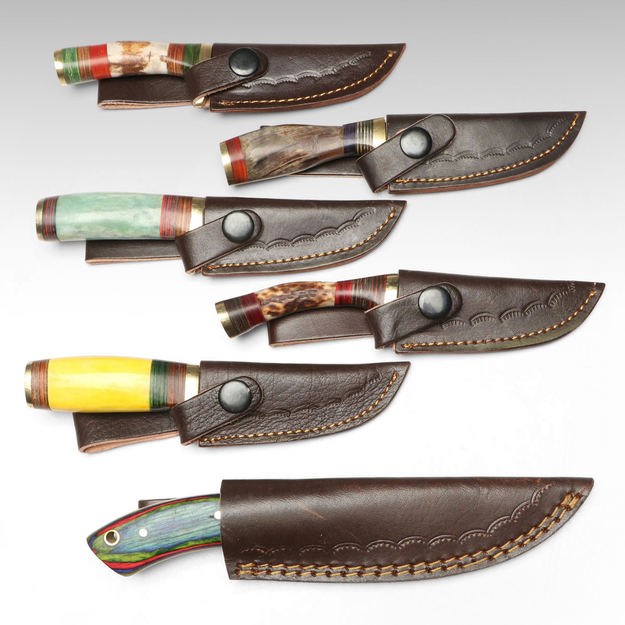 Damascus Steel Skinner and Hunting Knives in Leather Scabbards