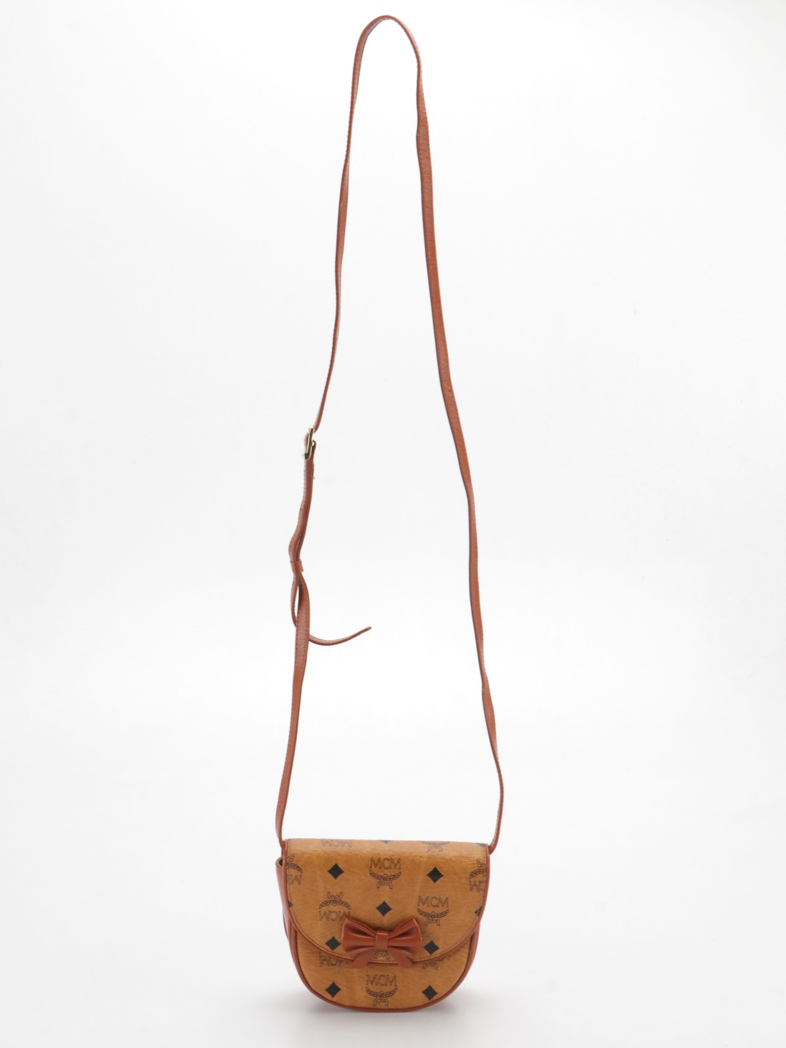 MCM Mini Bow Flap Crossbody Bag in Cognac Visetos Canvas & Leather