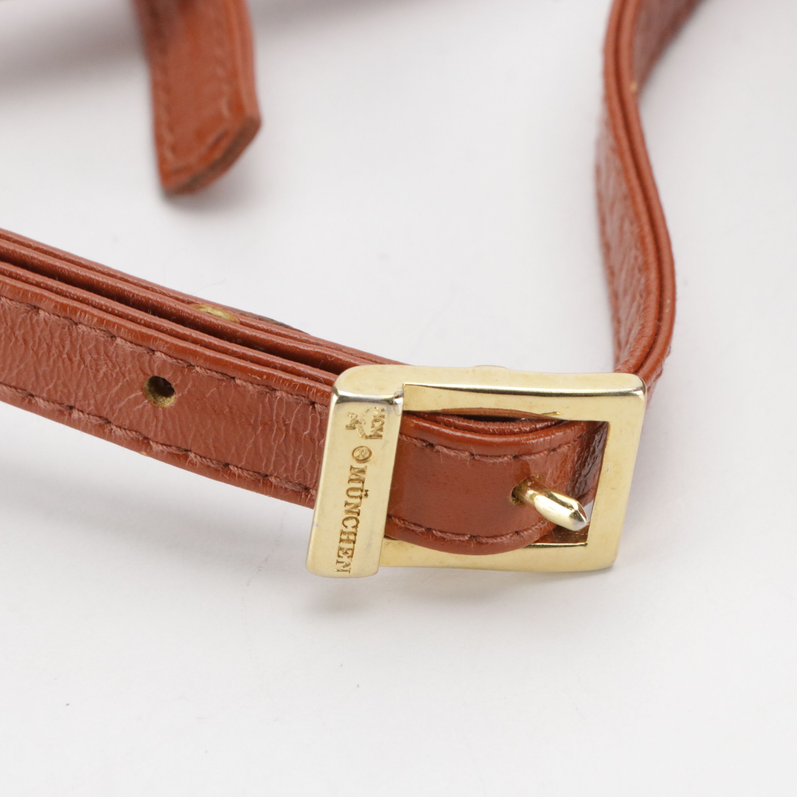 MCM Mini Bow Flap Crossbody Bag in Cognac Visetos Canvas & Leather