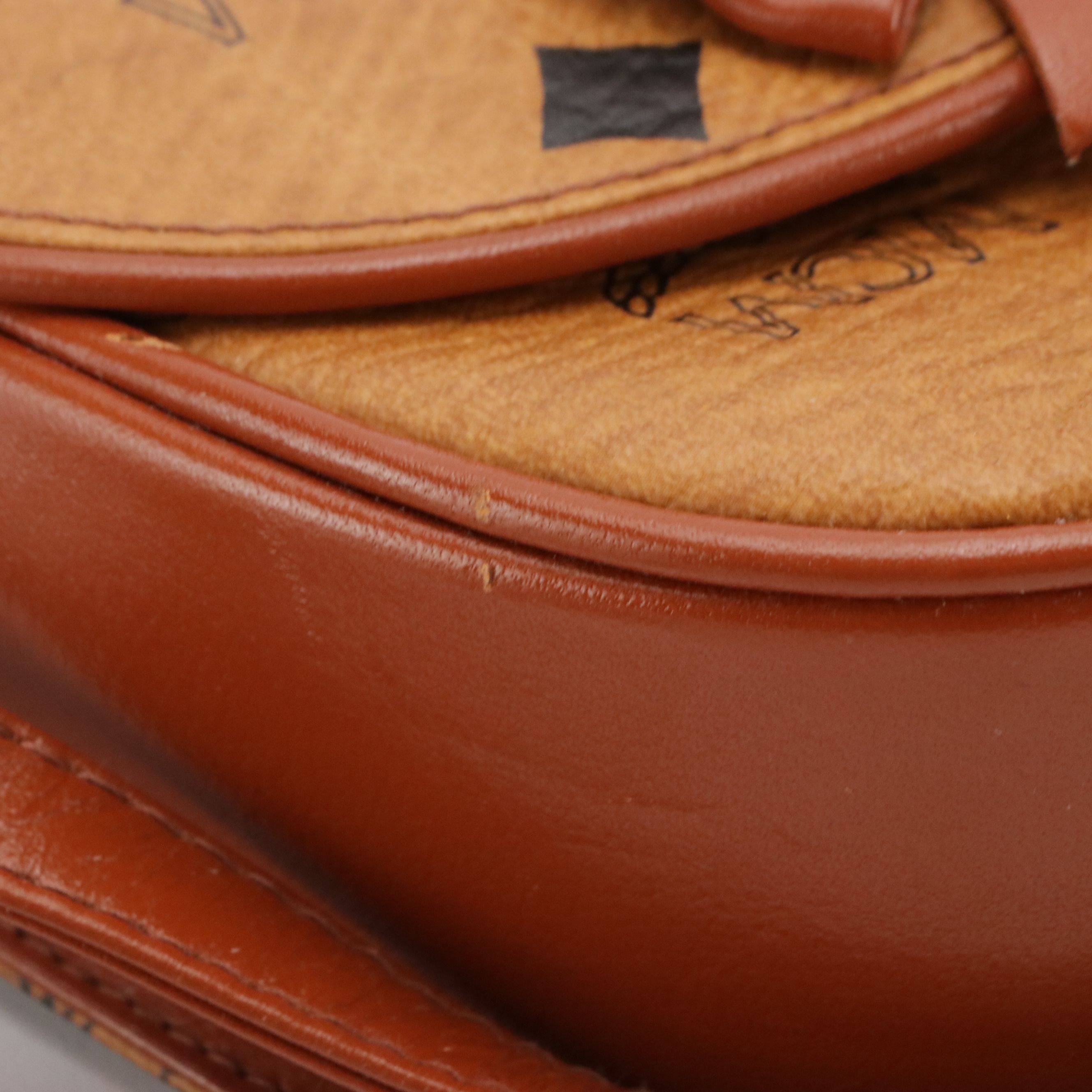 MCM Mini Bow Flap Crossbody Bag in Cognac Visetos Canvas & Leather