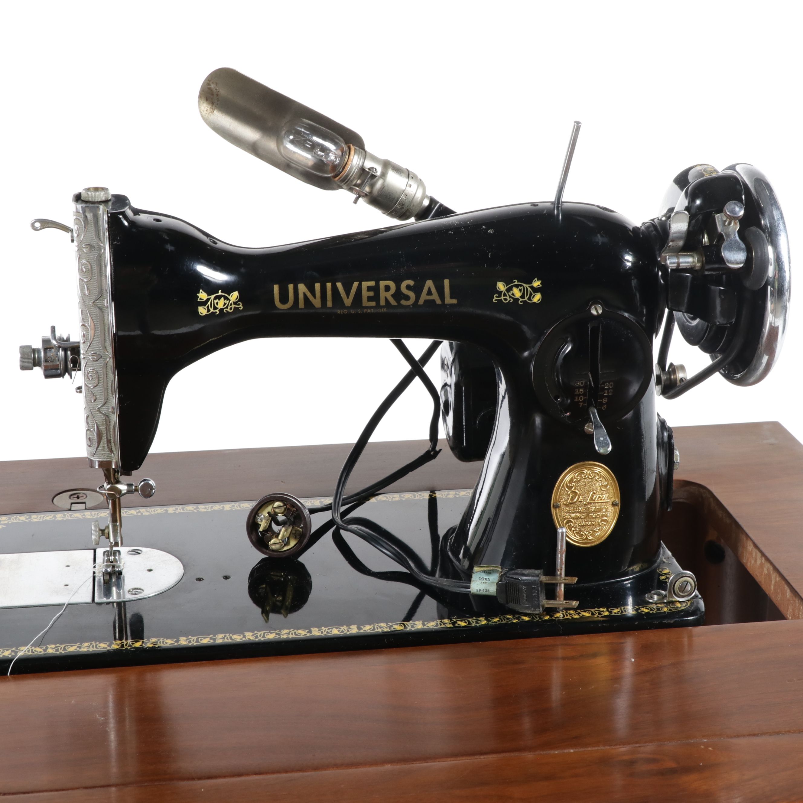 Vintage Universal "Deluxe" Sewing Machine in Table