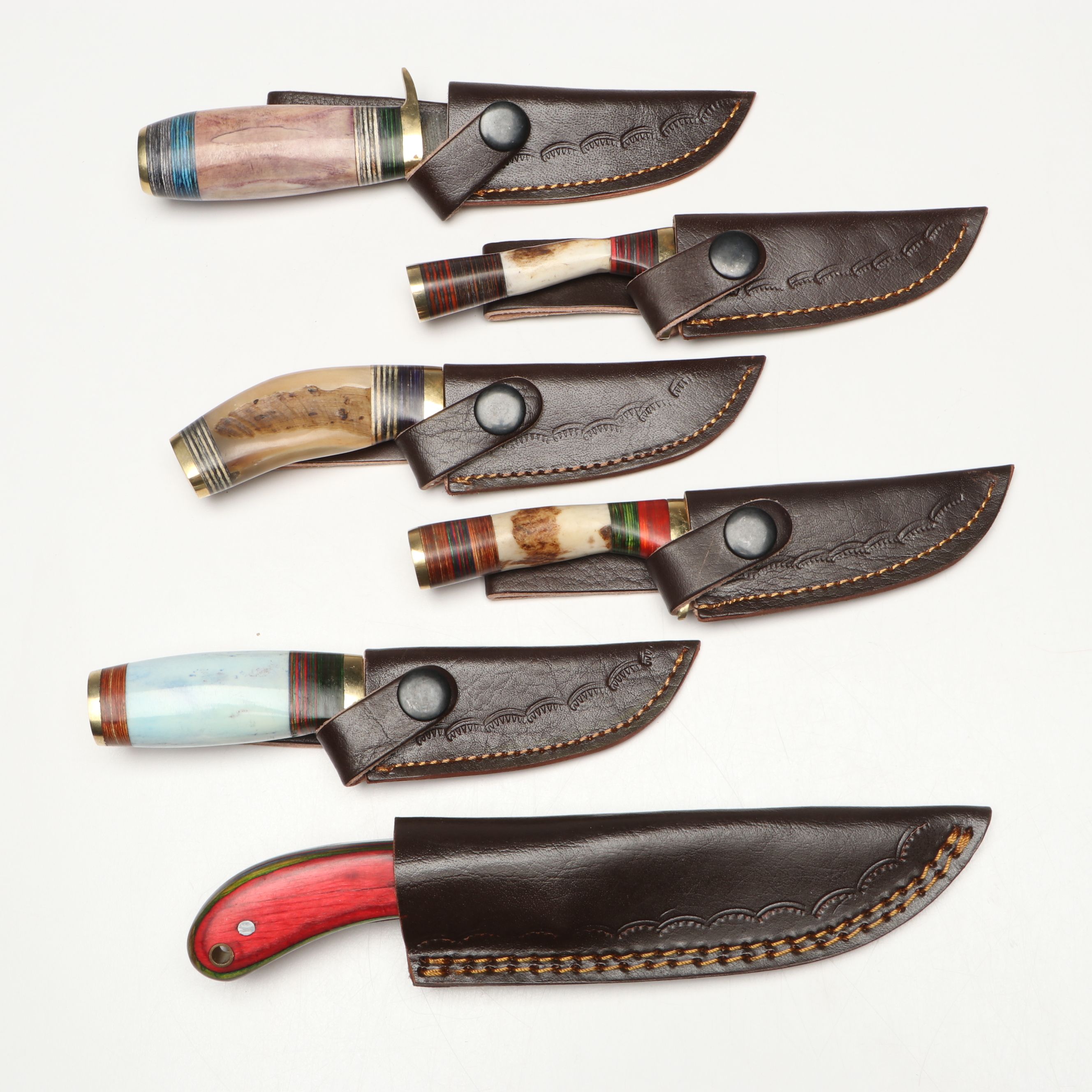 Damascus Steel Skinner and Hunting Knives in Leather Scabbards