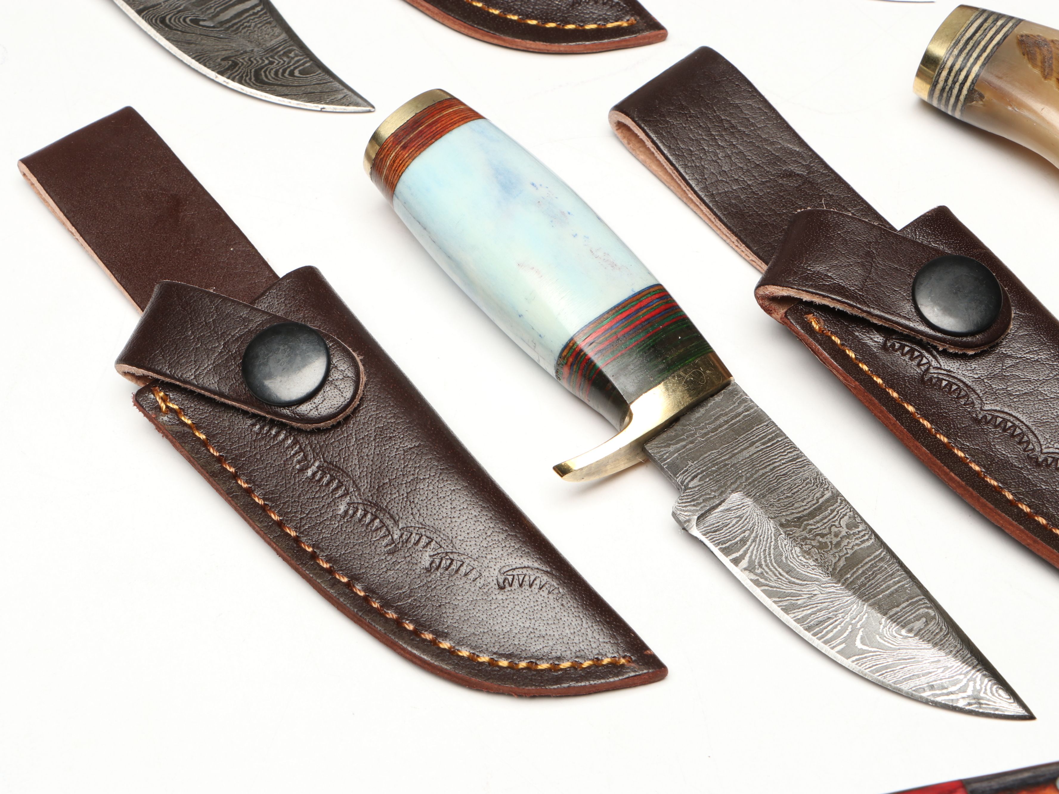 Damascus Steel Skinner and Hunting Knives in Leather Scabbards