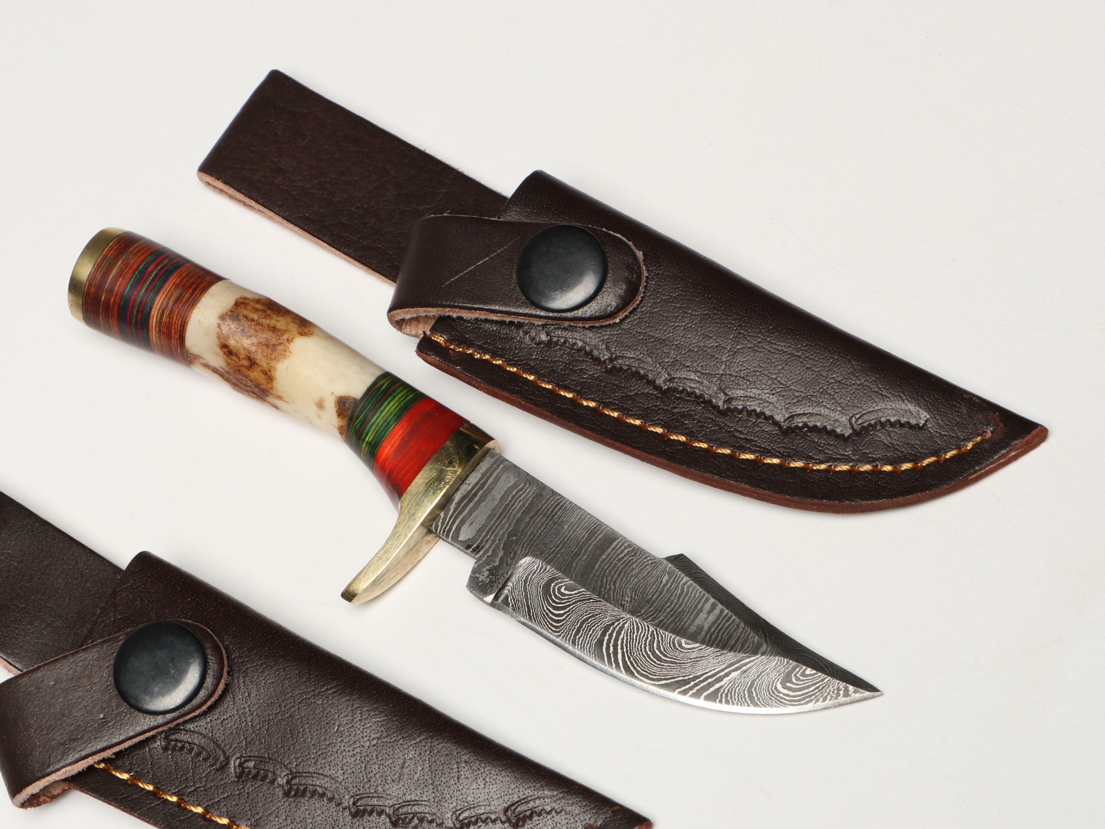 Damascus Steel Skinner and Hunting Knives in Leather Scabbards