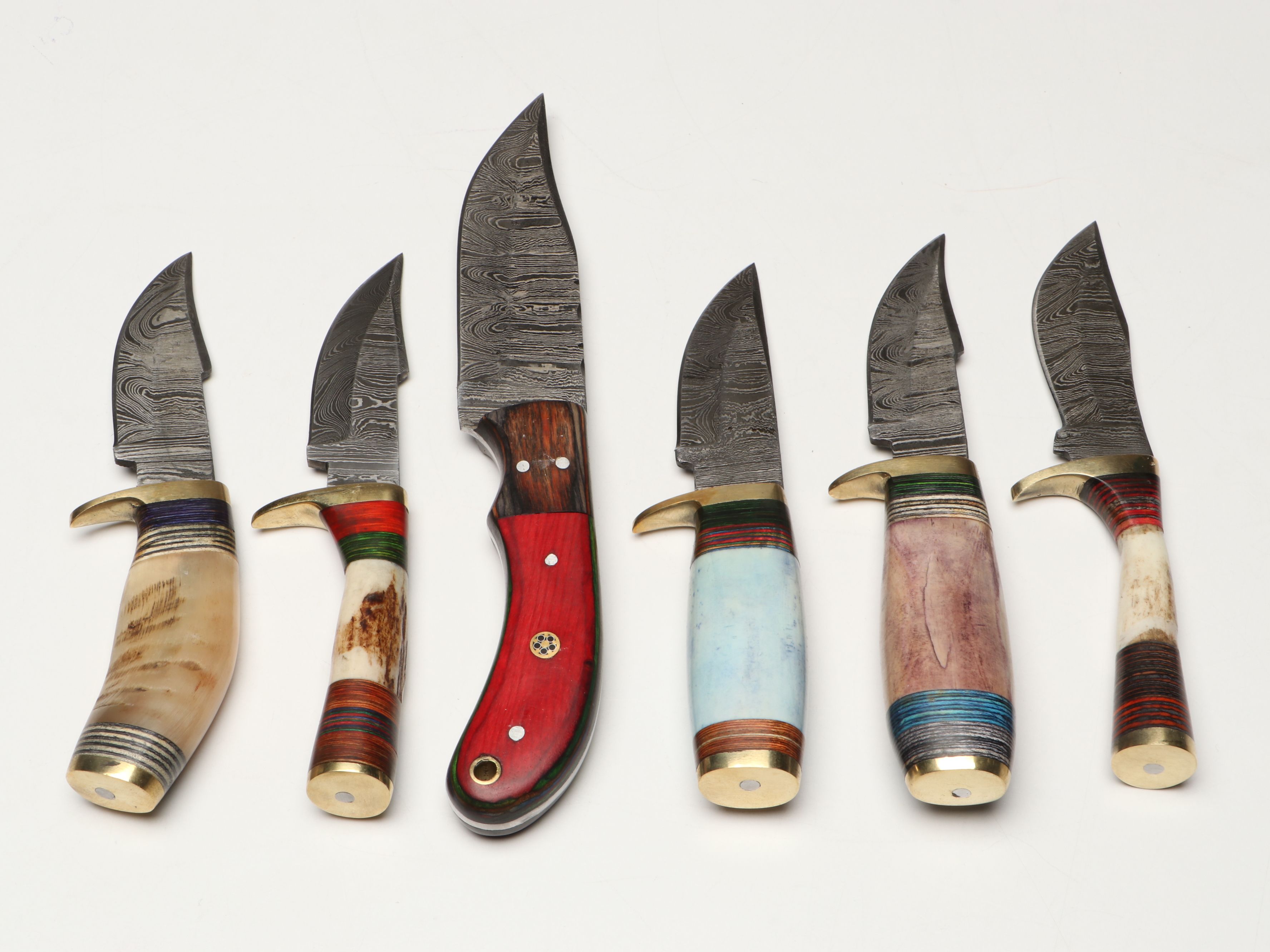 Damascus Steel Skinner and Hunting Knives in Leather Scabbards