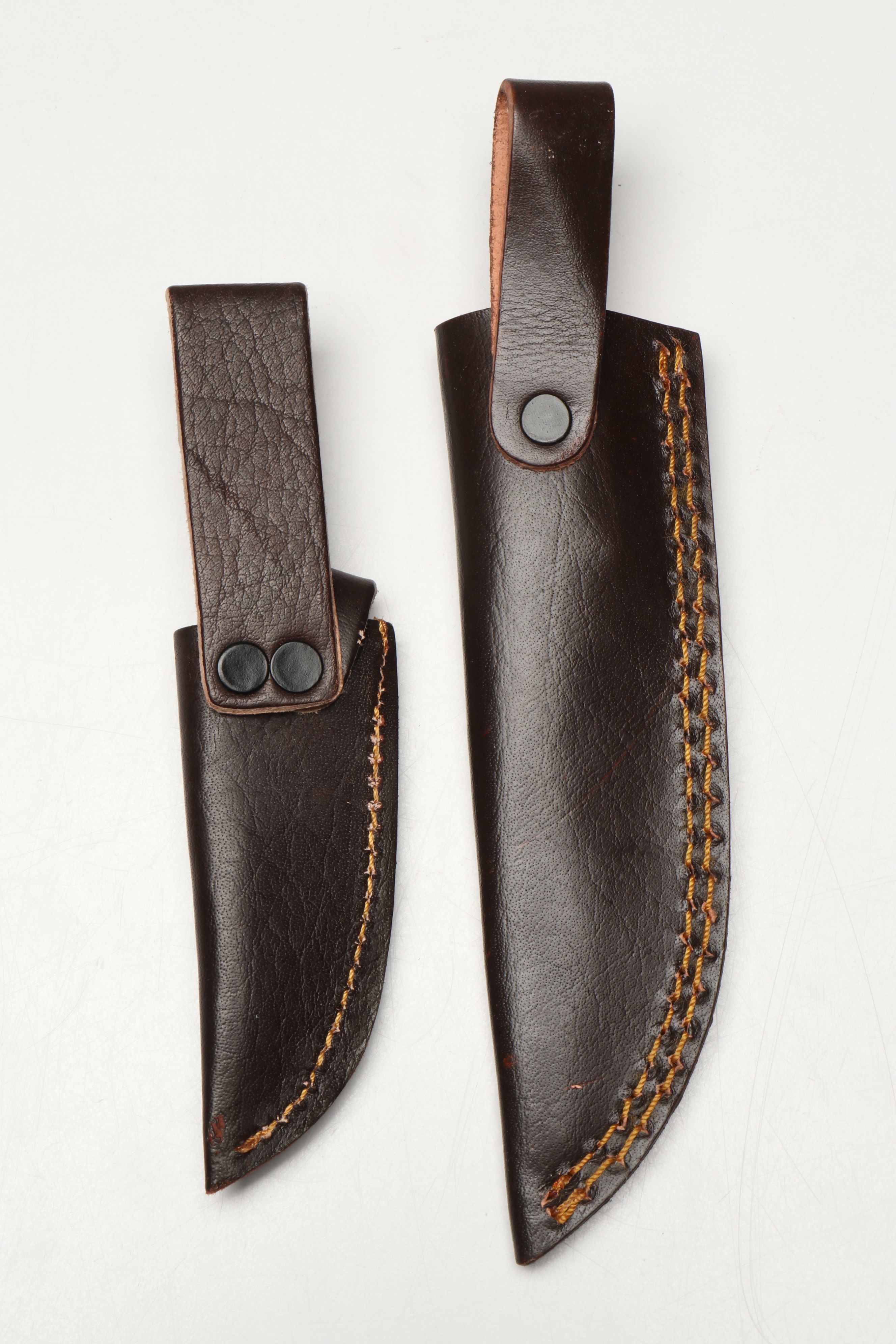 Damascus Steel Skinner and Hunting Knives in Leather Scabbards