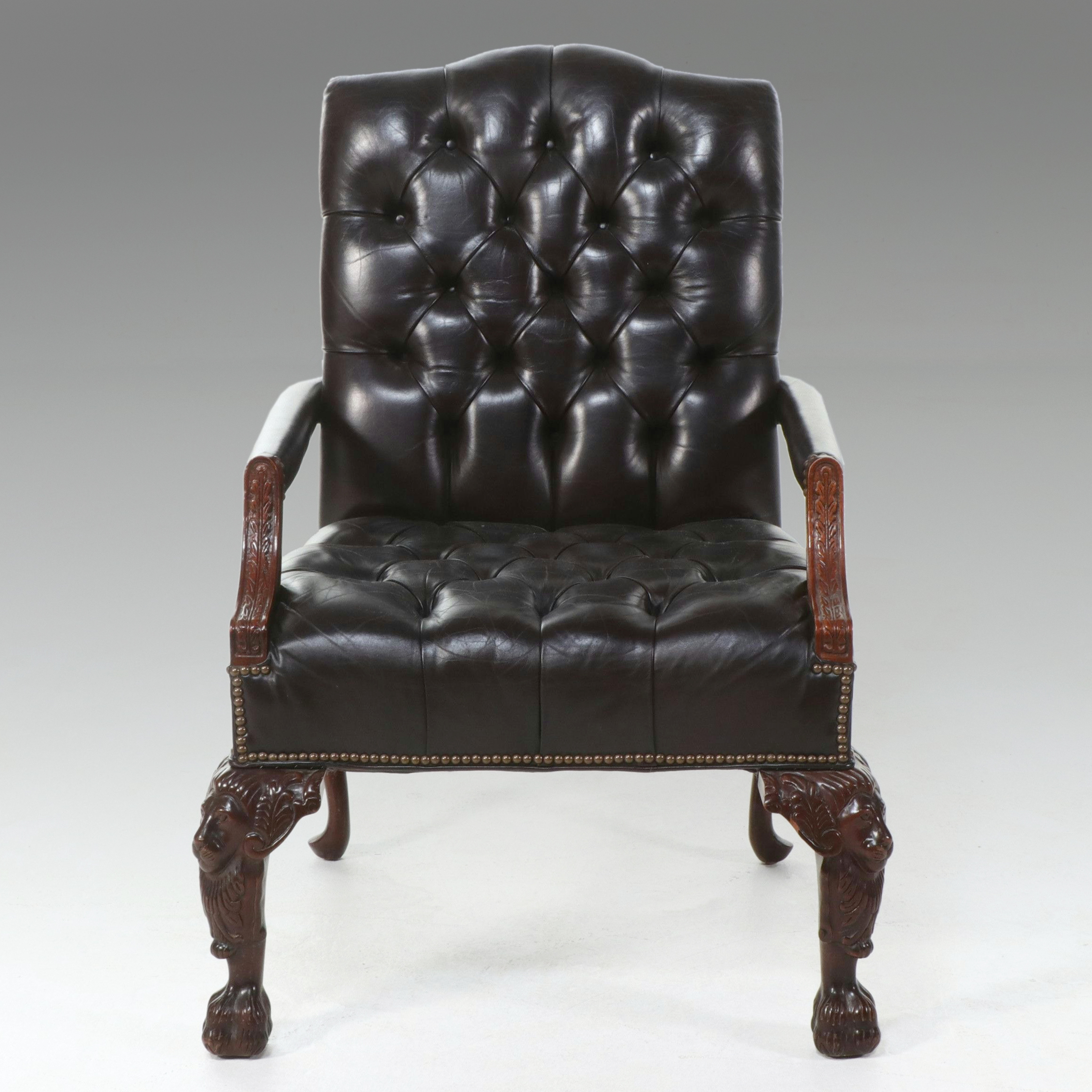 Georgian Style Tufted Leather Library Chair with Lion Mask Carvings