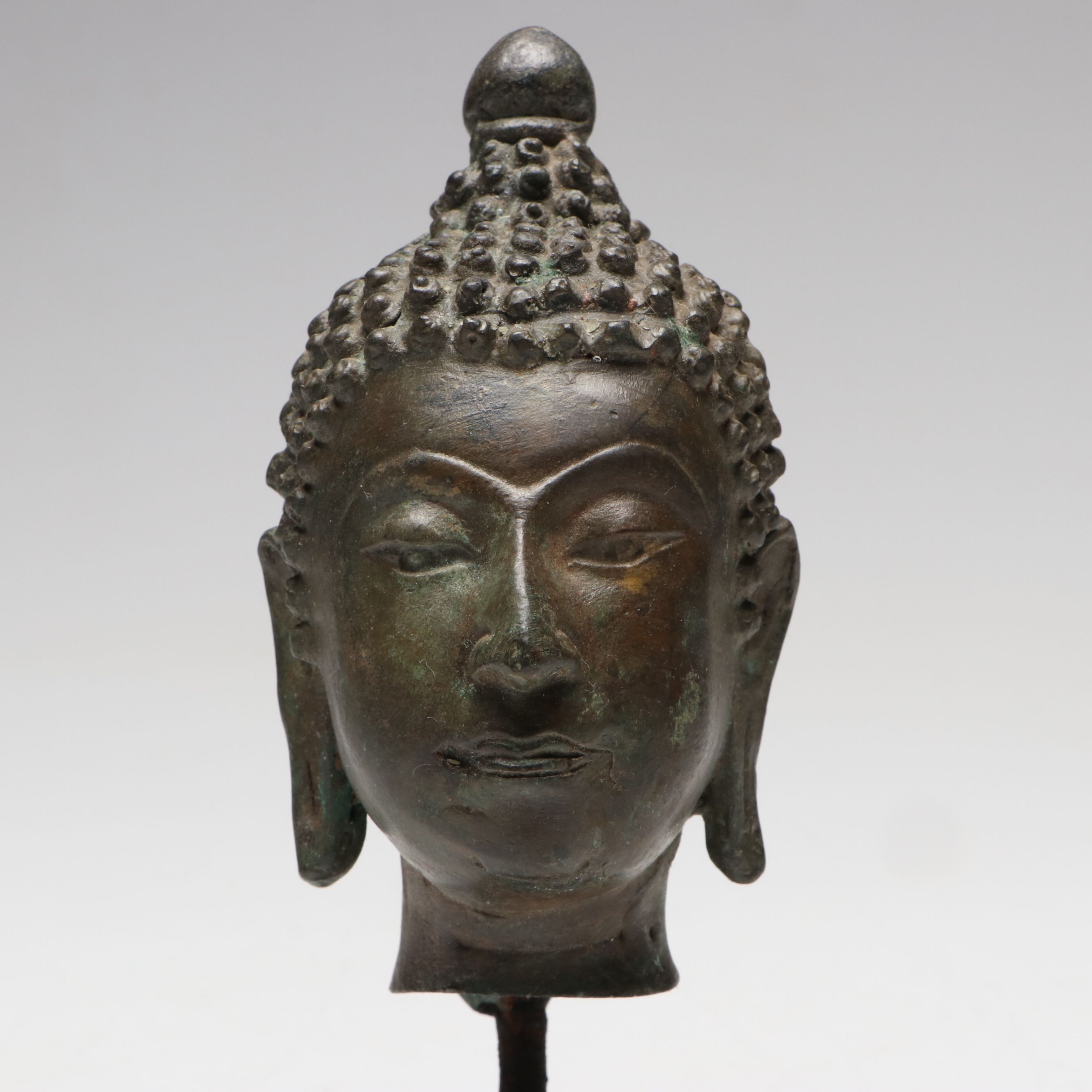 Patinated Cast Metal Buddha Head