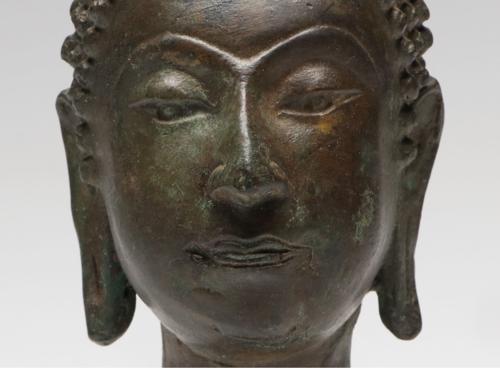 Patinated Cast Metal Buddha Head