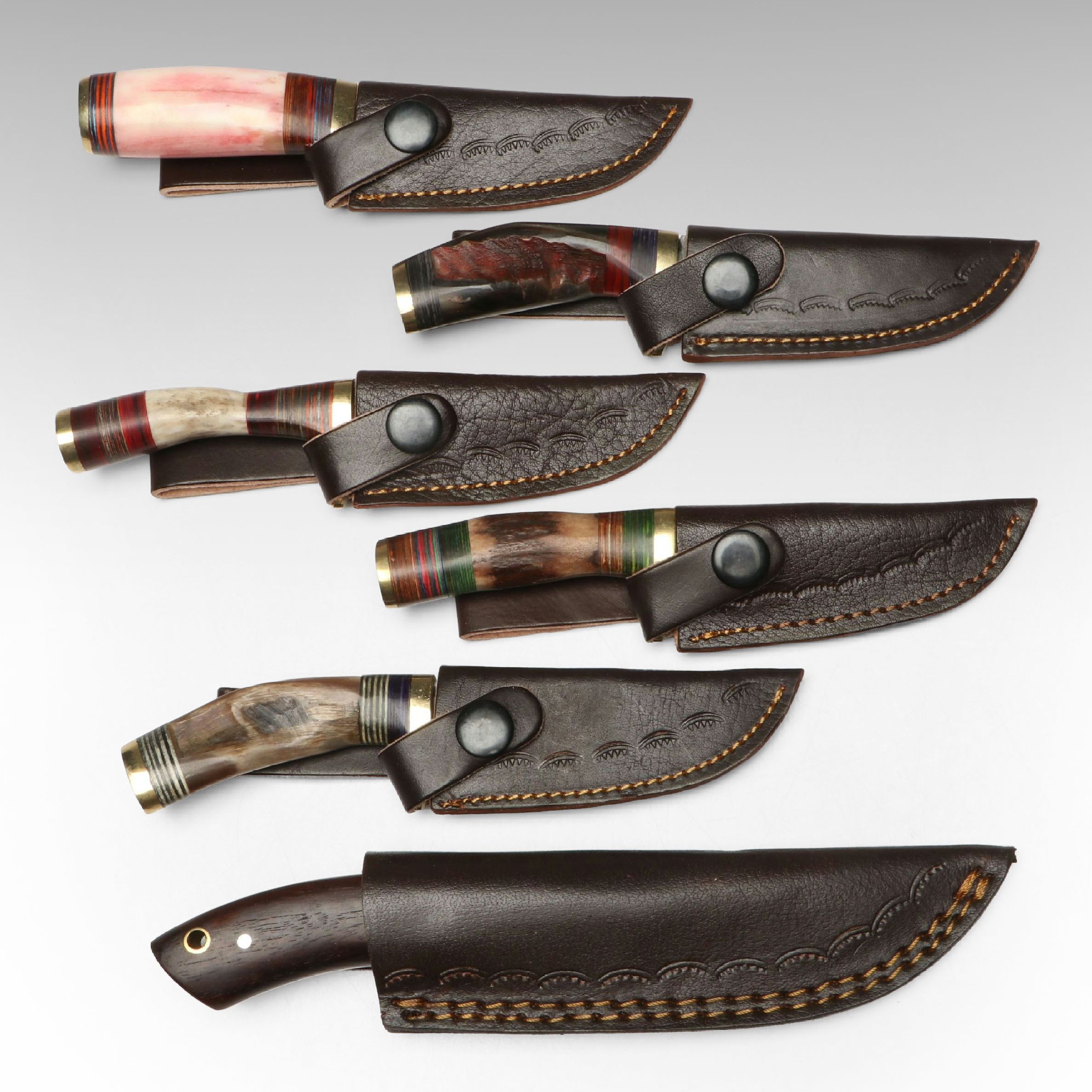 Damascus Steel Skinner and Hunting Knives in Leather Scabbards