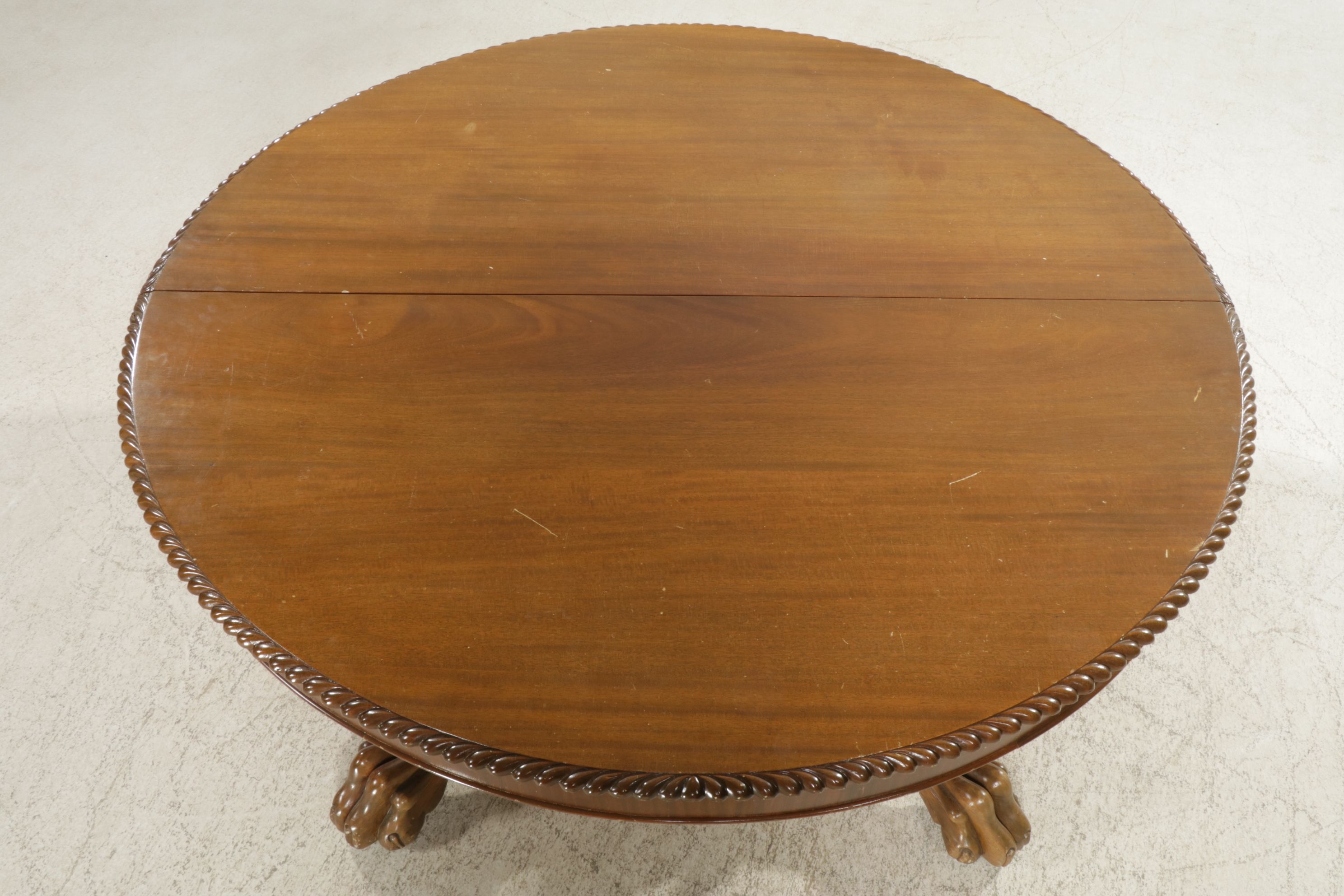 Victorian Carved Mahogany Banquet Table with Lion's Head Legs and Paw Feet