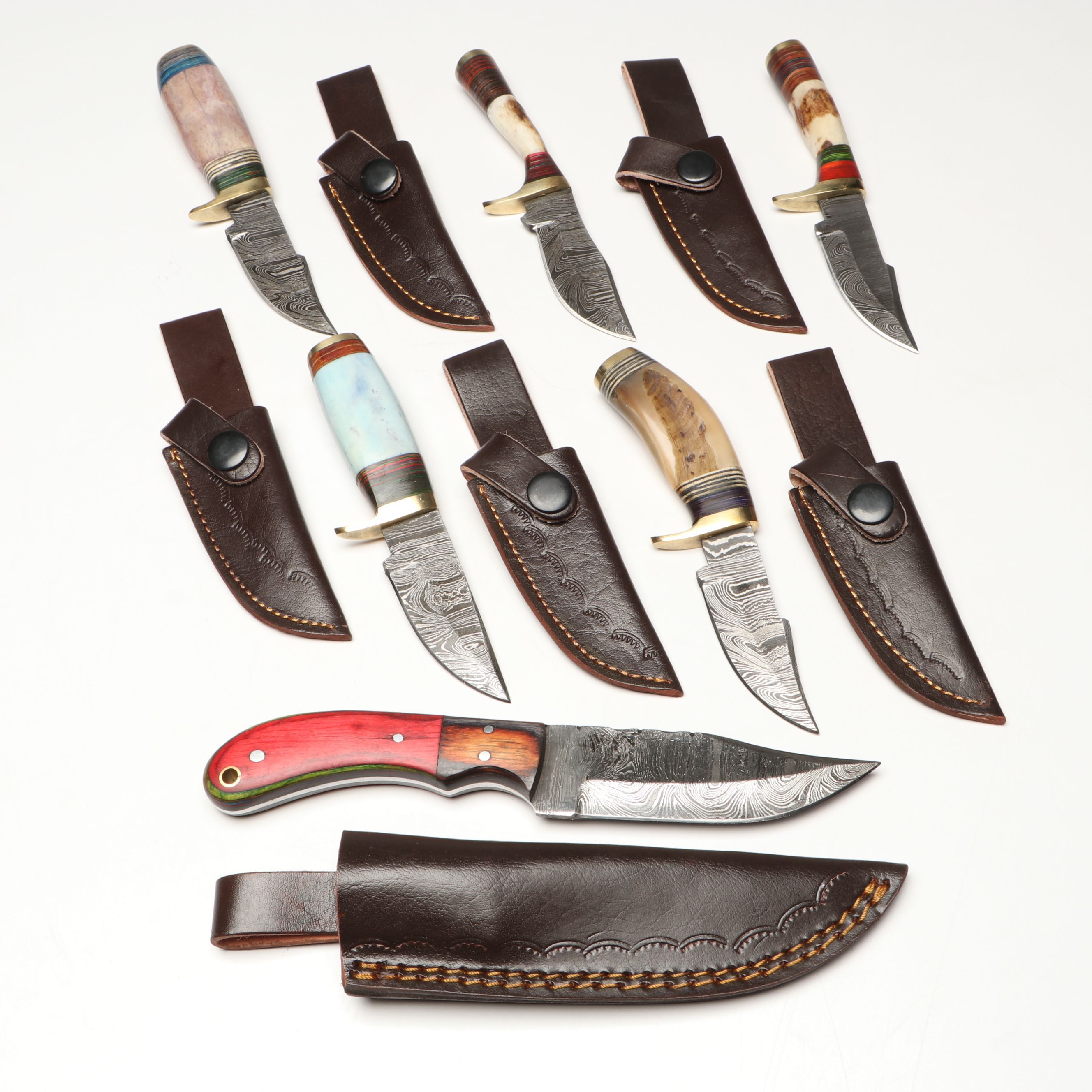 Damascus Steel Skinner and Hunting Knives in Leather Scabbards