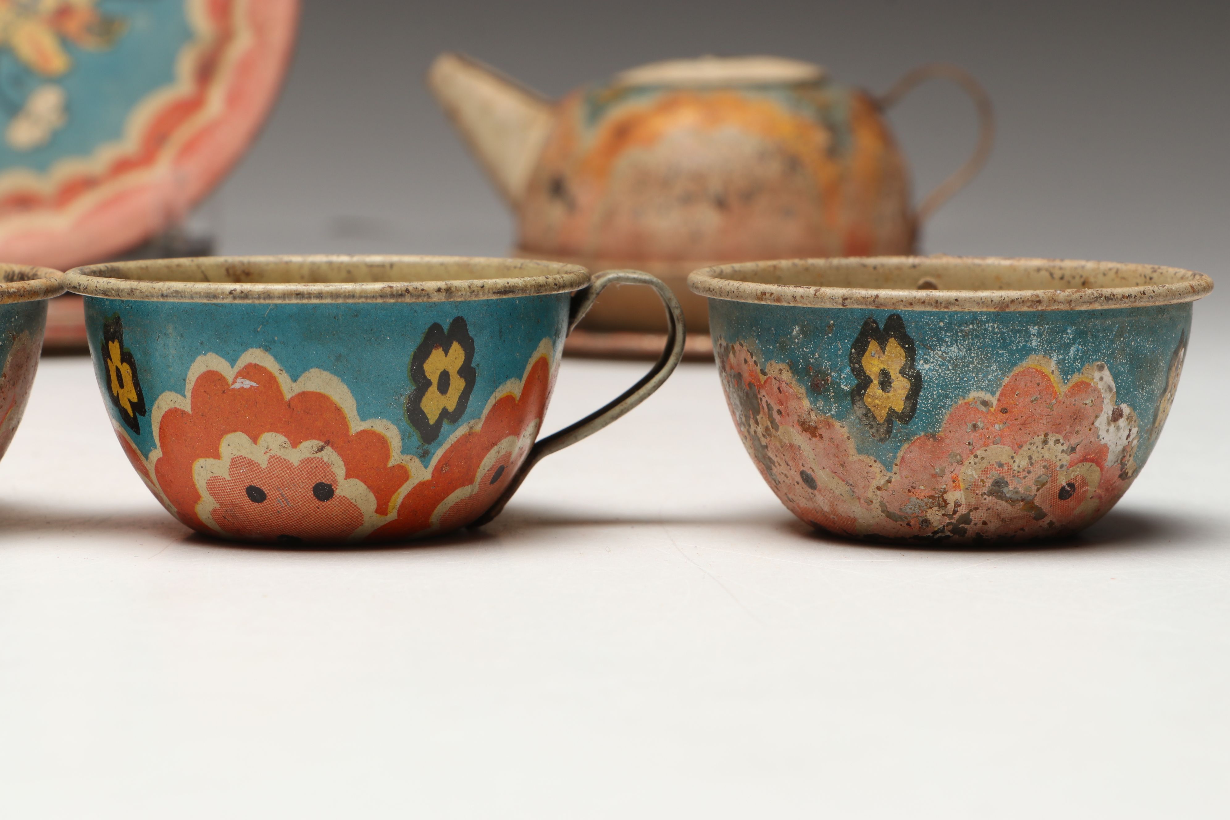 Dog and Floral Themed Tin Litho Children's Tea Set Pieces, Mid-20th Century