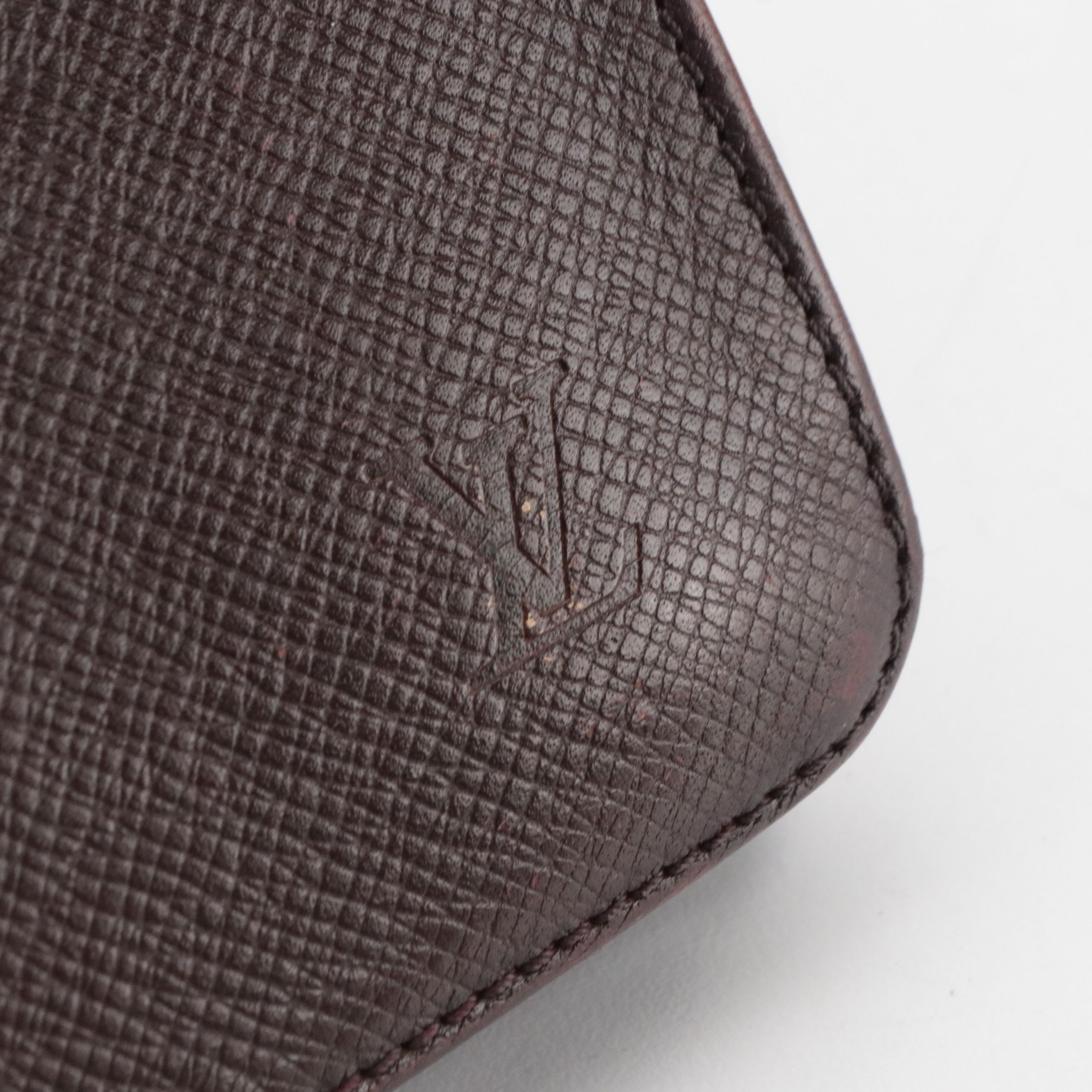 Louis Vuitton Pochette Kourad Wristlet in Taïga Leather