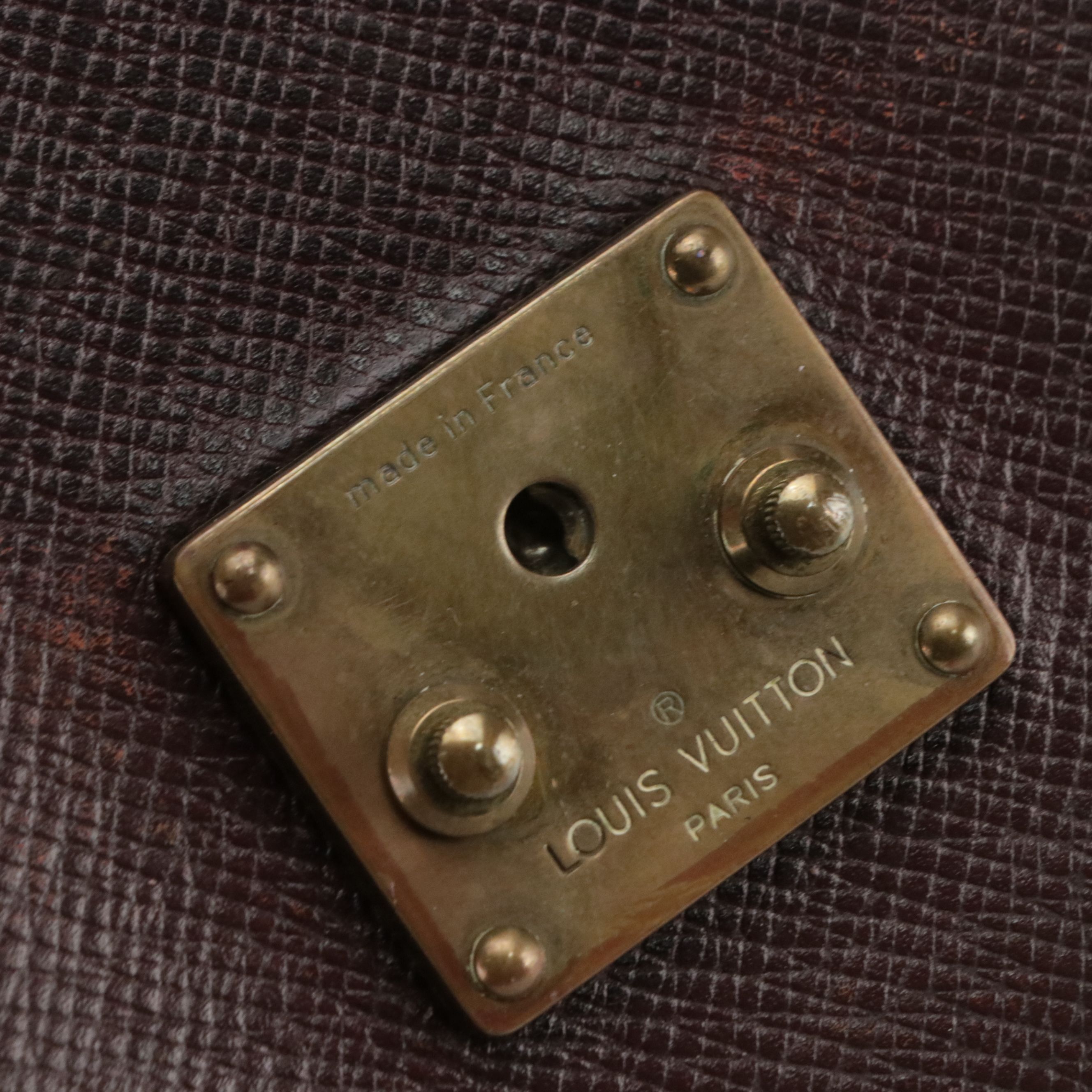 Louis Vuitton Pochette Kourad Wristlet in Taïga Leather