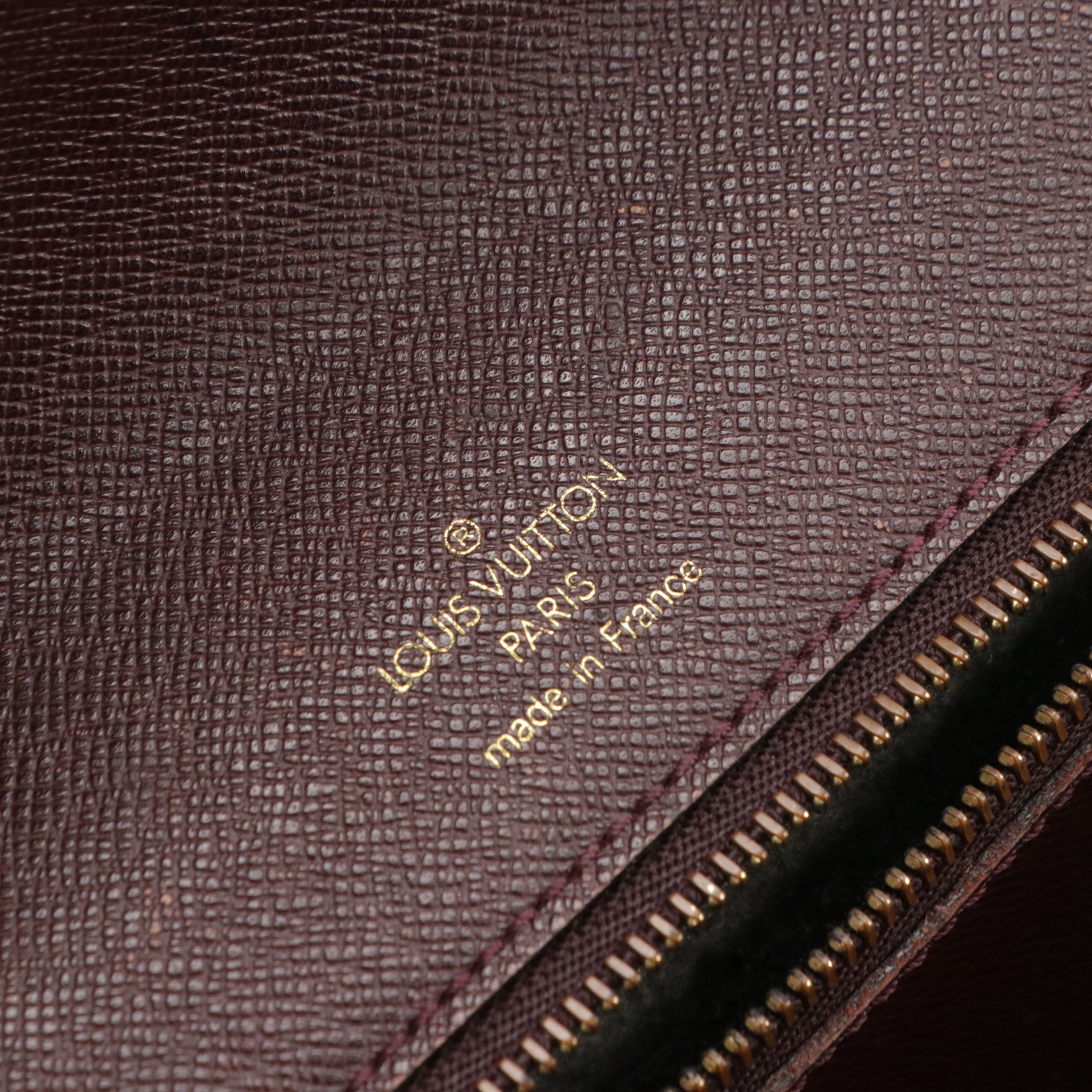 Louis Vuitton Pochette Kourad Wristlet in Taïga Leather